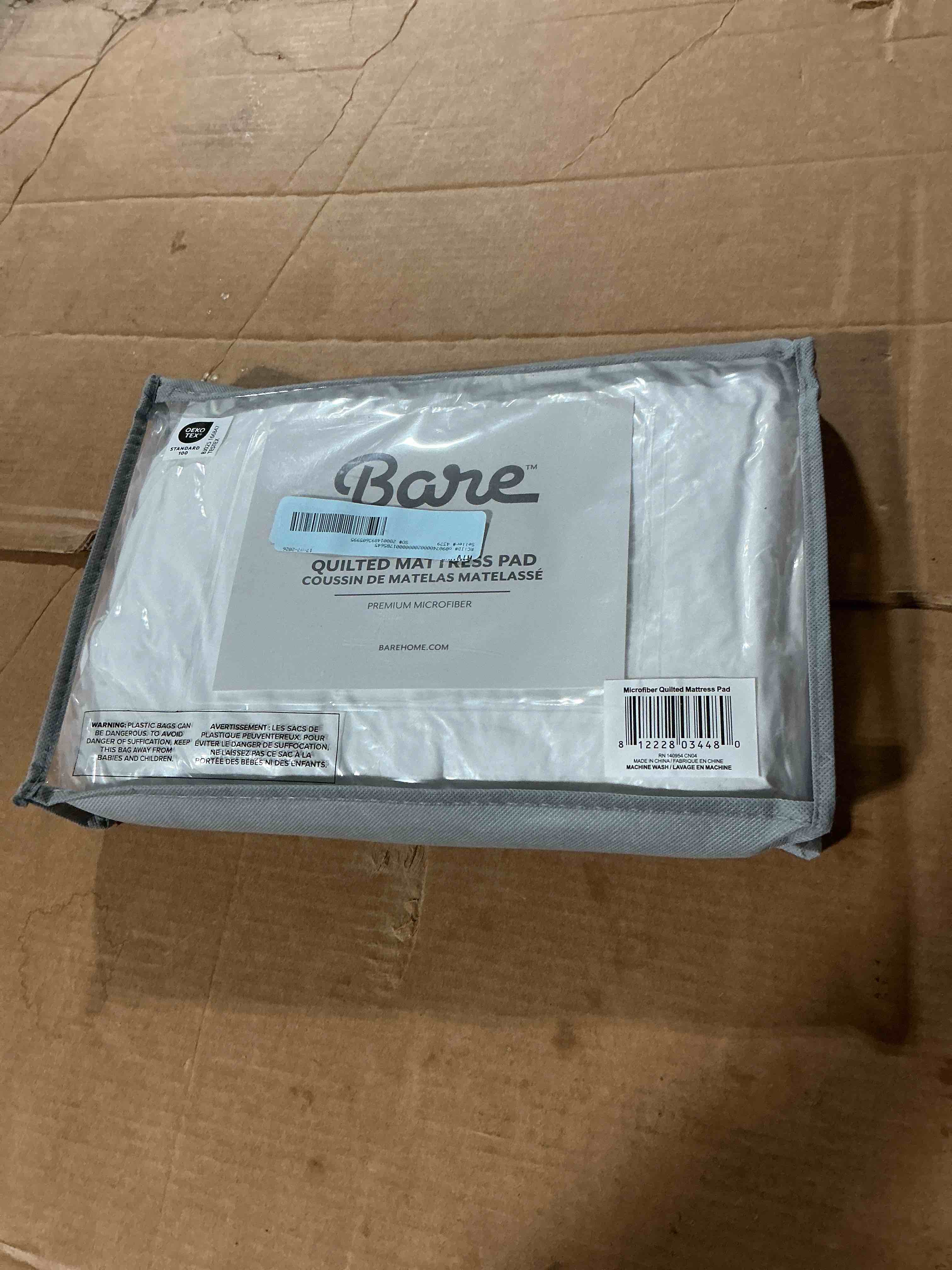 Condition photo showing New/Like New for bare home quilted mattress pad - cooling mattress cover - deep pocket - twin-xl white