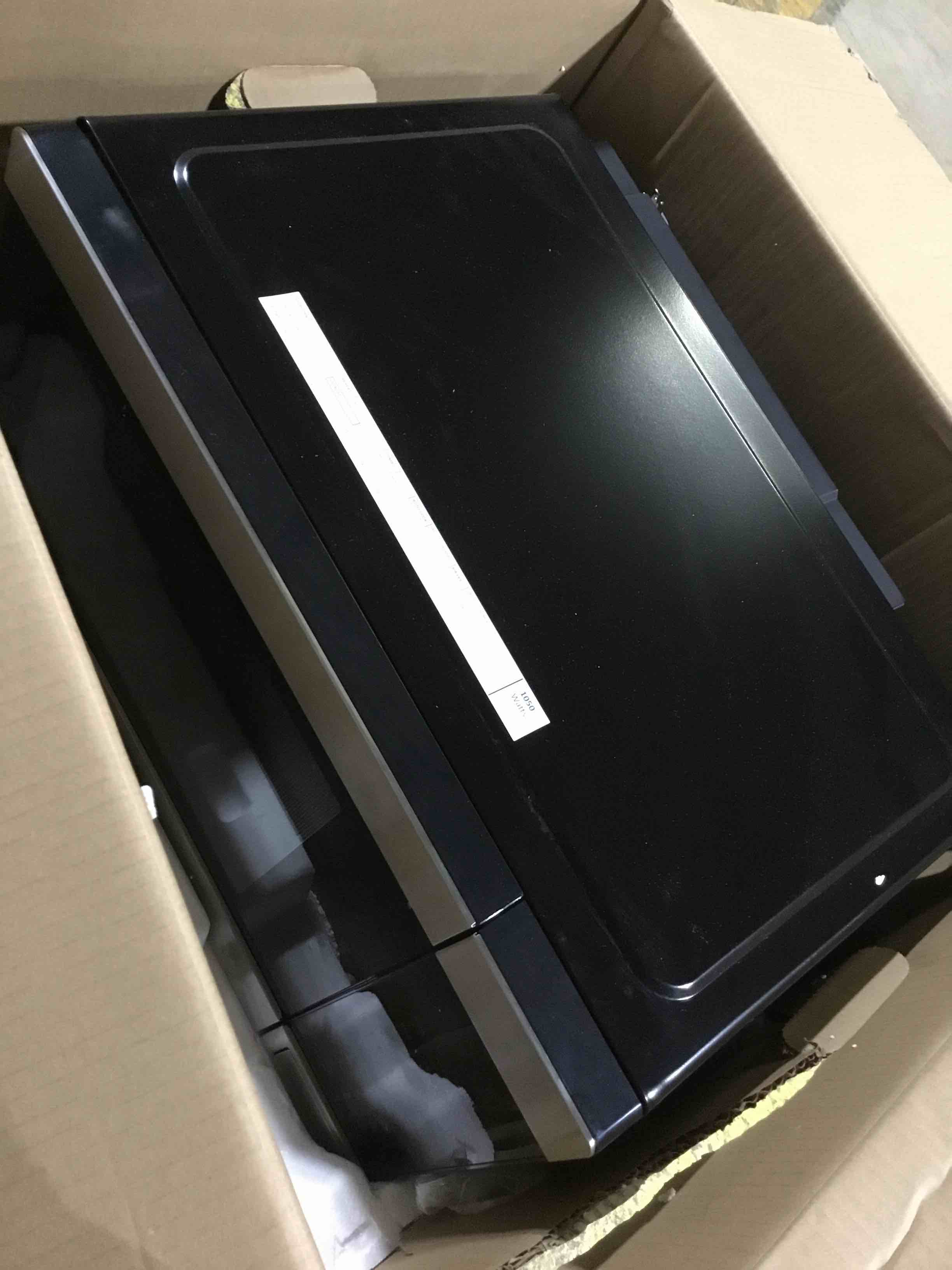 Condition photo showing Good Condition for ge gcst10a1wss 4-in-1 microwave oven, 1,050 watts air fryer, broiler & convection mode, child-lock technology, kitchen essentials for the countertop or dorm room, 1.0 cu. ft, stainless steel