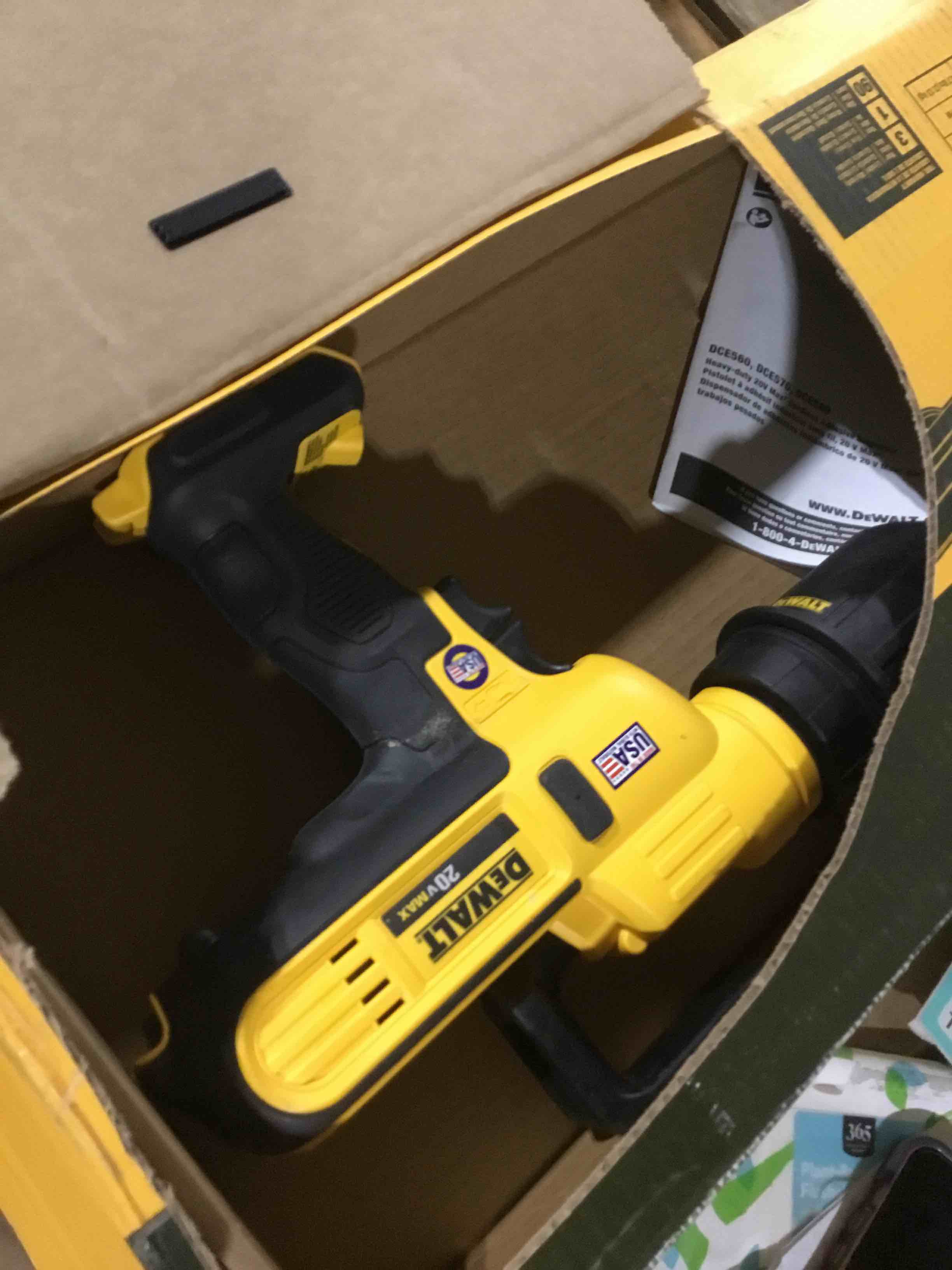 Condition photo showing As Is for DEWALT 20V MAX* Cordless Caulking Gun, 29oz, Tool Only (DCE570B)