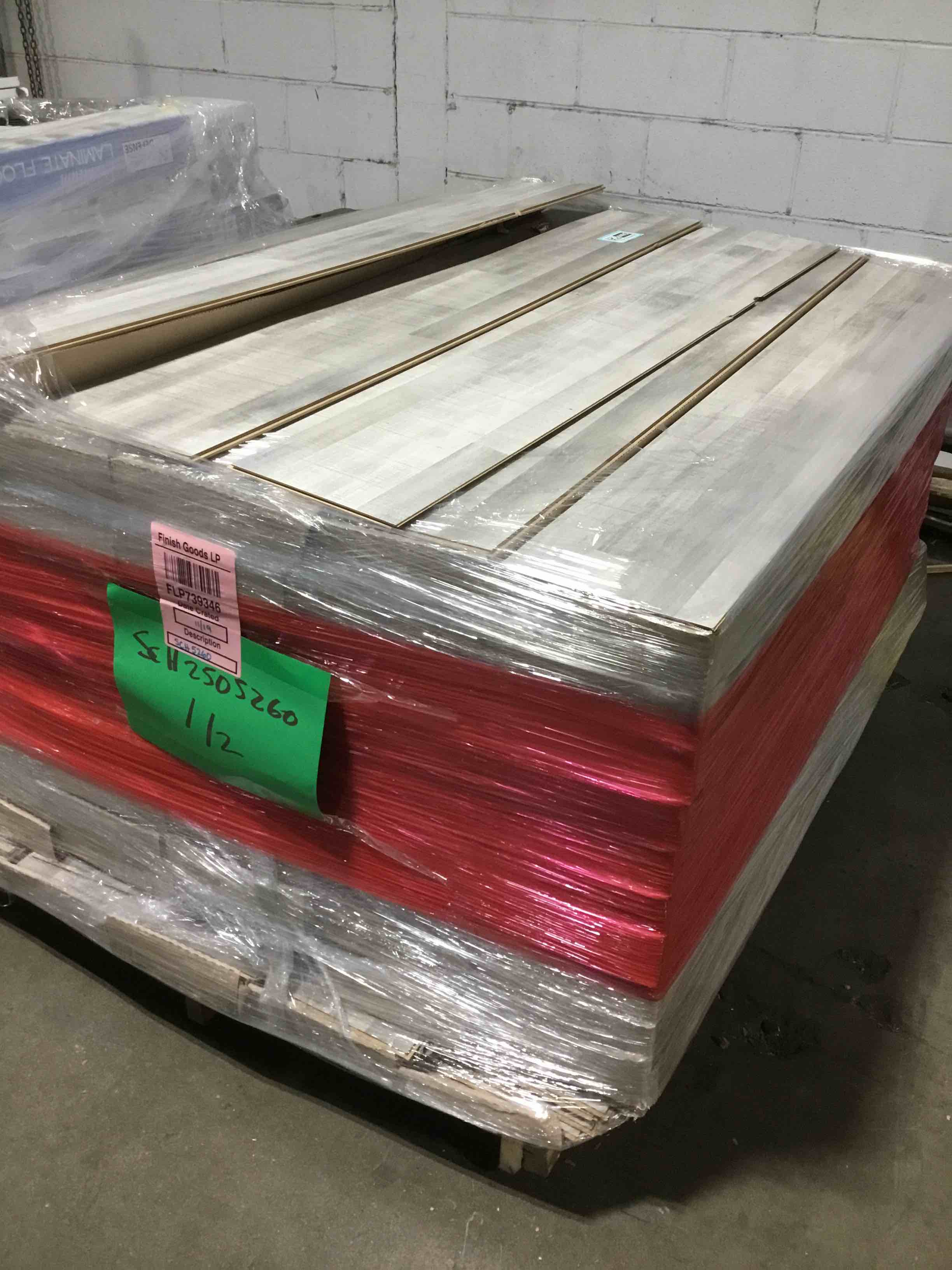 Condition photo showing As Is for 1376 sq ft of 7.75” x50.75” laminate flooring your bid per sq ft 