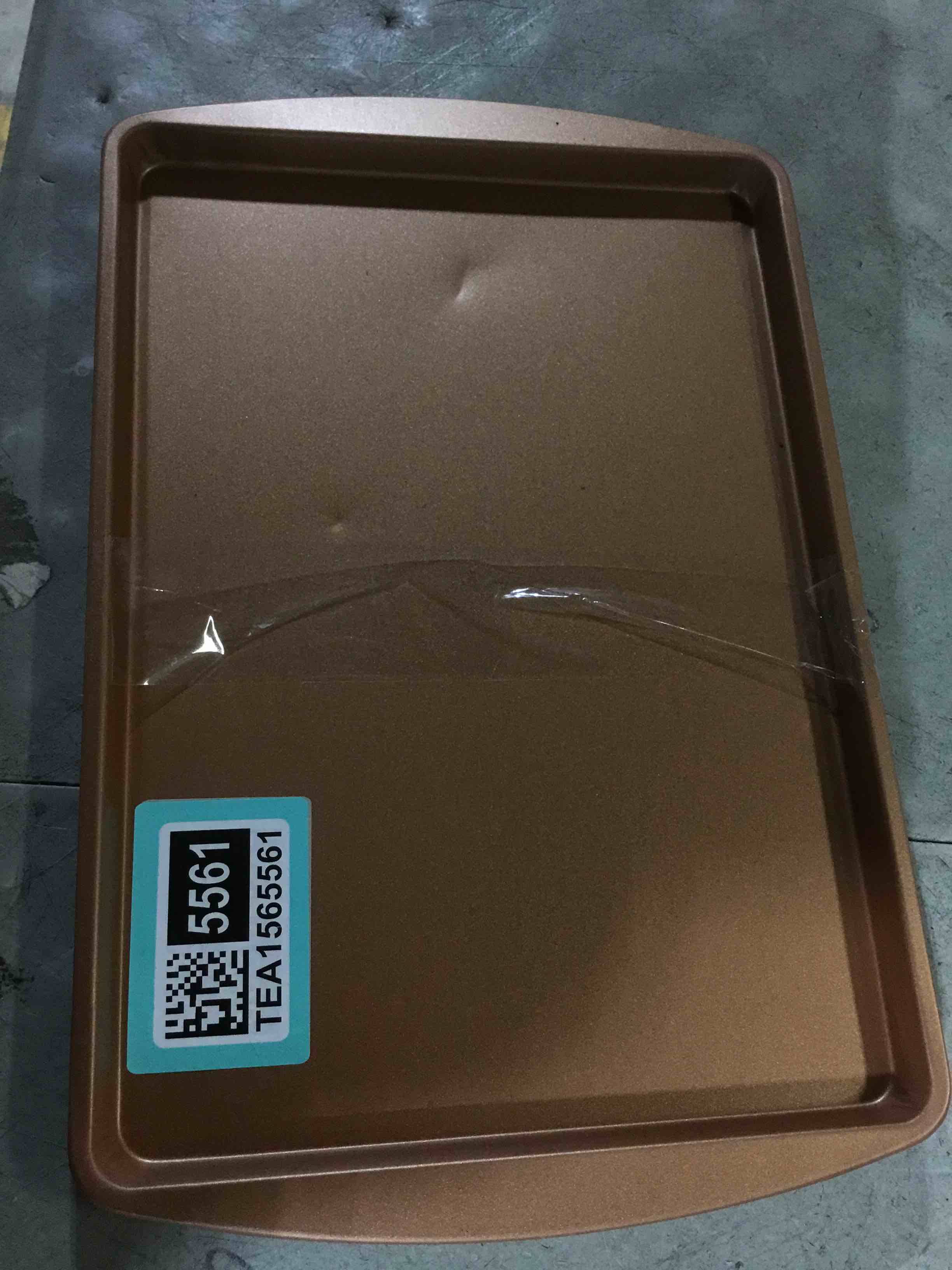 Condition photo showing As Is for (dented)(set of 2) 15”x9.5” copper cookie sheets 