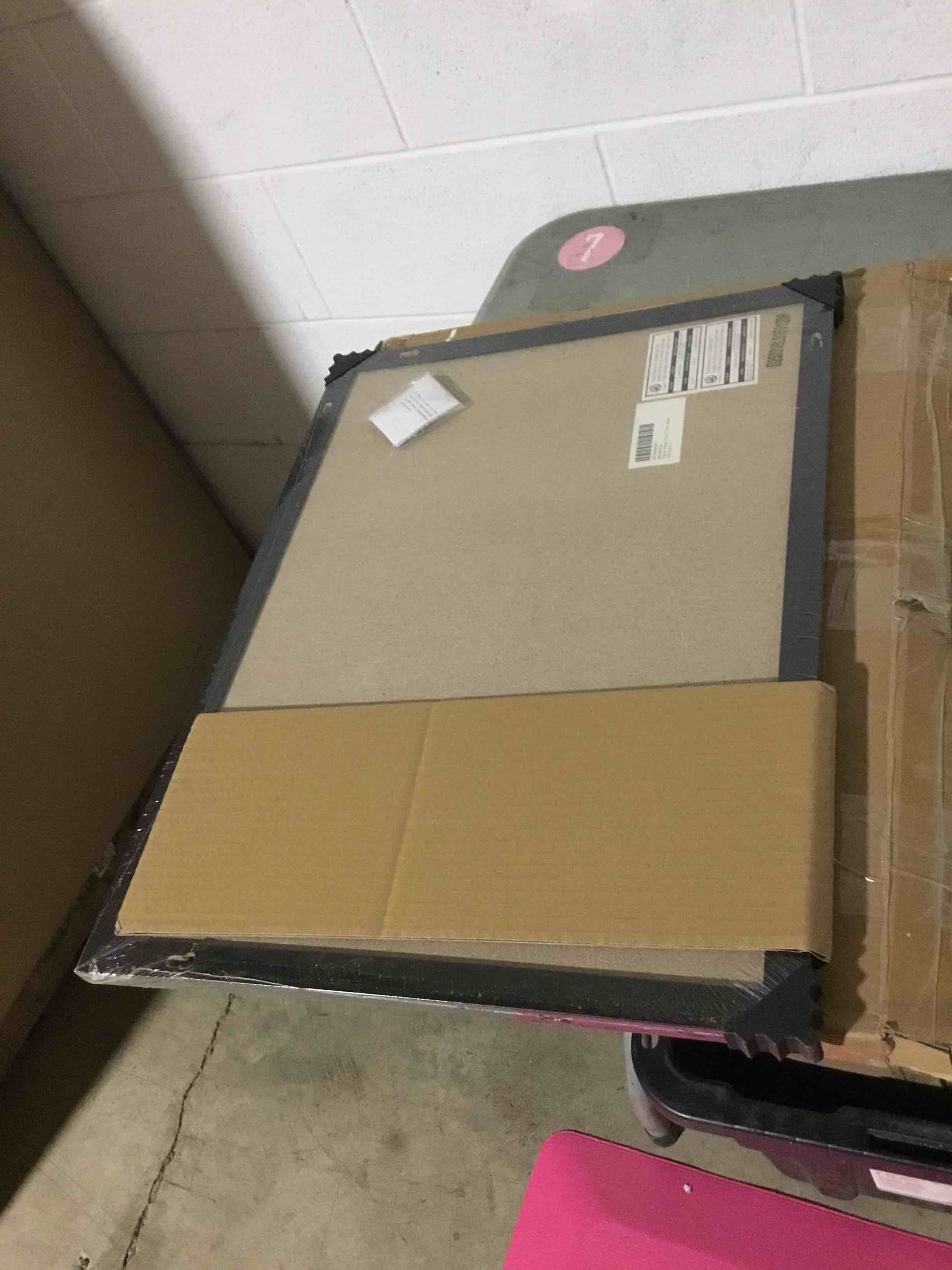 Condition photo showing New/Like New for u brands cork bulletin board, 17" x 23", black wood frame 17" x 23" black