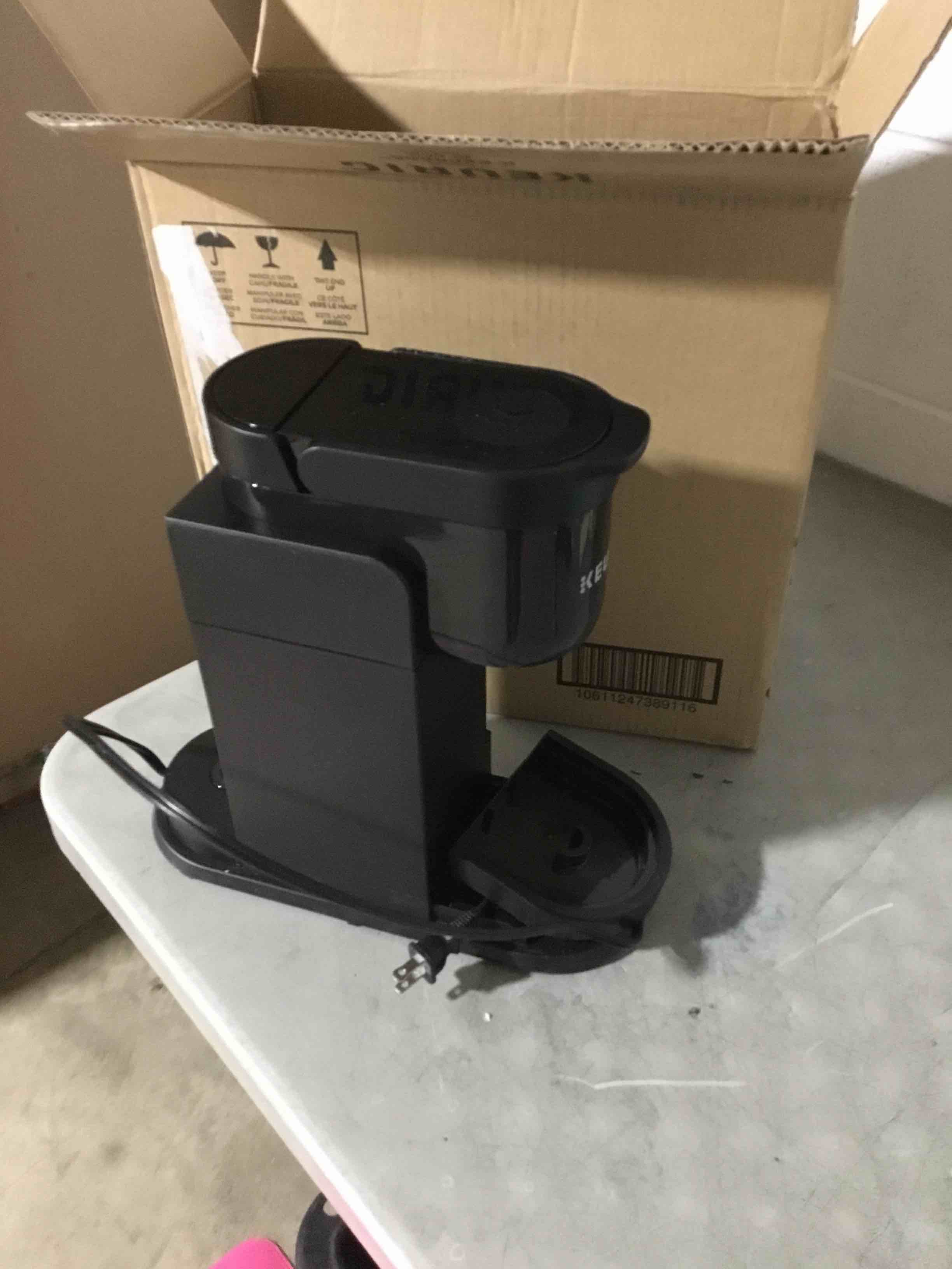 Condition photo showing As Is for product incomplete, keurig k-express single serve k-cup pod coffee maker, 3 brew sizes, strong button feature, 42oz removable reservoir, black
