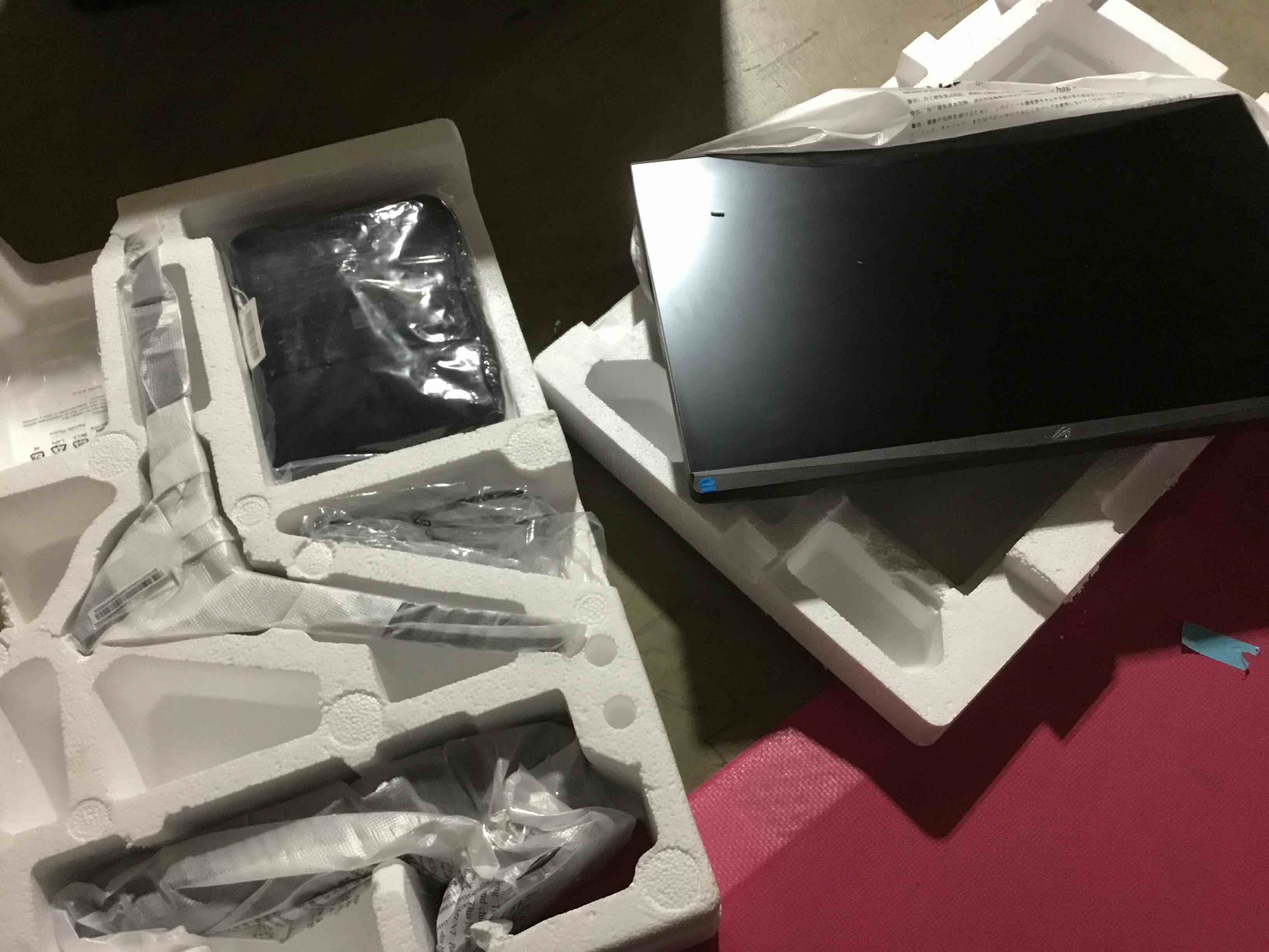 Condition photo showing As Is for (MINOR DAMAGED AND LOOSE BOTTOM FRAME) ASUS ROG Strix 27” 1440P Gaming Monitor (XG27AQMR) - 27”, QHD (2560 x 1440), Fast IPS, 300Hz, 1ms, G-SYNC Compatible, FreeSync Premium Pro, Extreme Low Motion Blur Sync, DisplayPort, DisplayHDR 600 27" Fast IPS 300Hz QHD G-SYNC