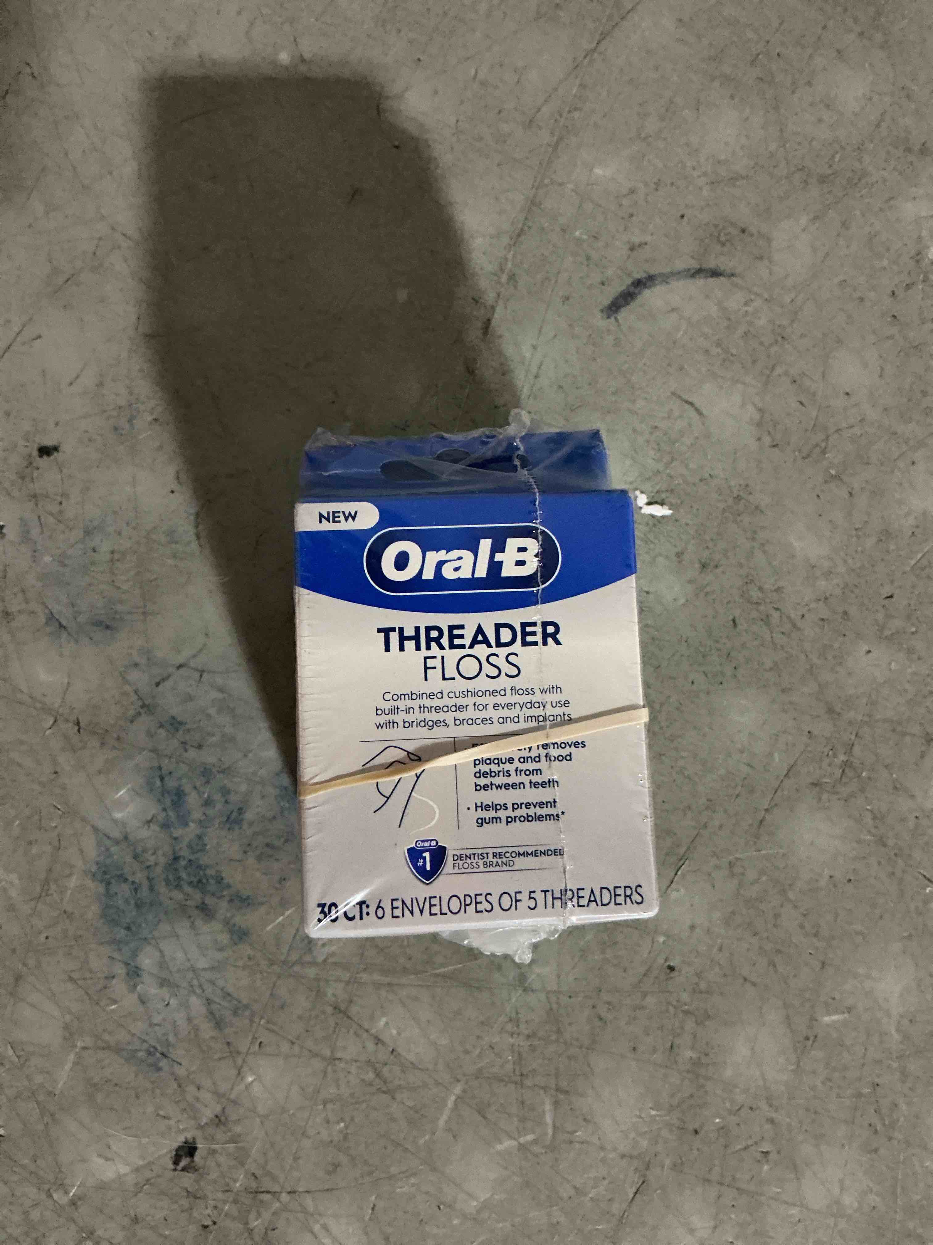 Condition photo showing As Is for oral-b glide threader floss (pack of 4)