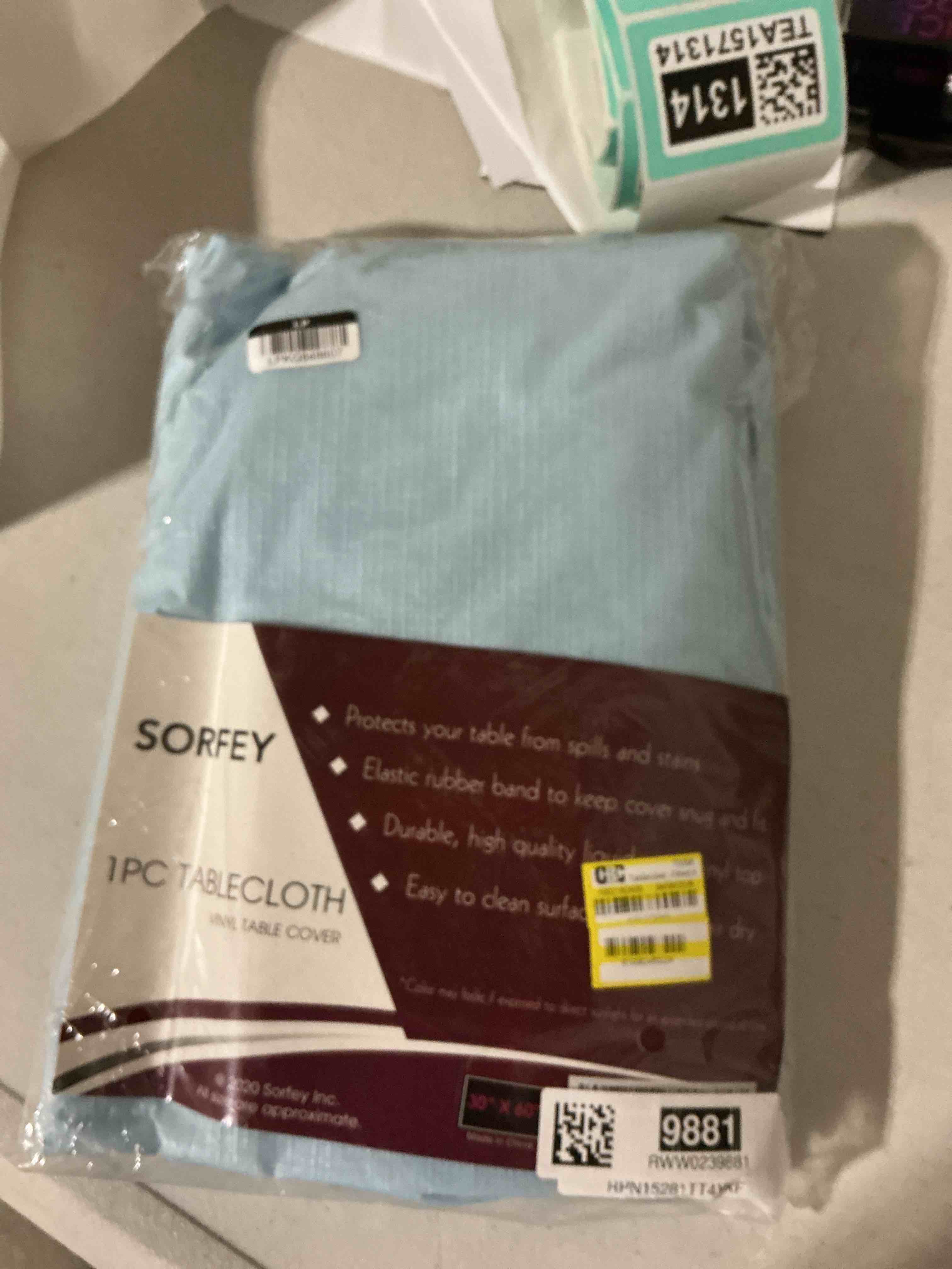 Condition photo showing As Is for sorfey tablecloth -fitted with elastic, vinyl with flannel back, fits for table 30"x 60" rectangle,water proof, easy to clean, solid baby blue design 60" x 30" (rectangular) baby blue