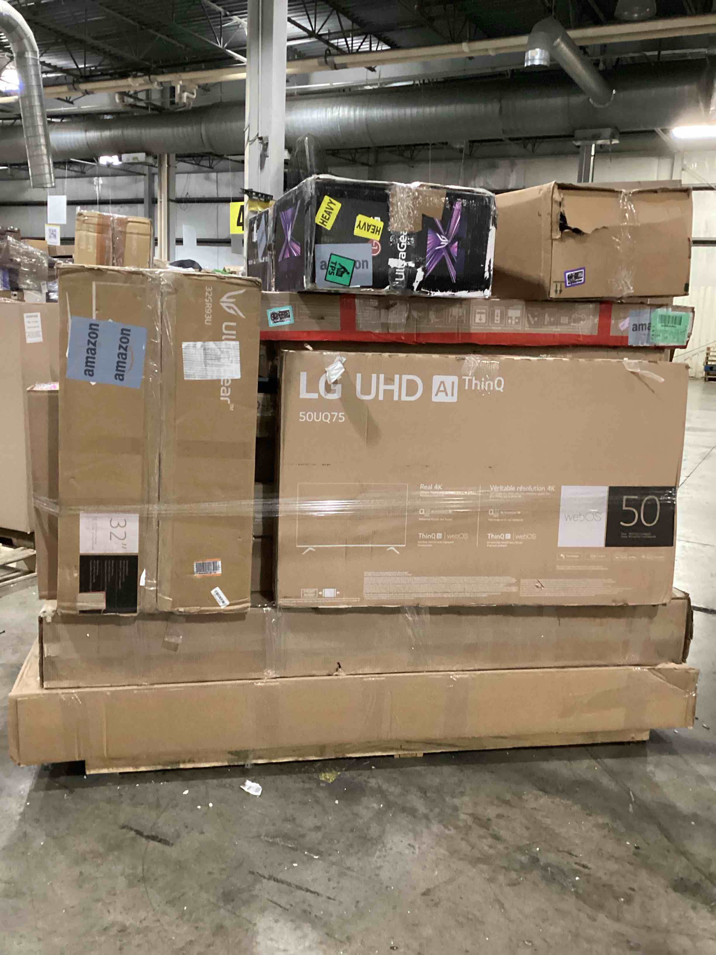 pallet of defective electronics for parts