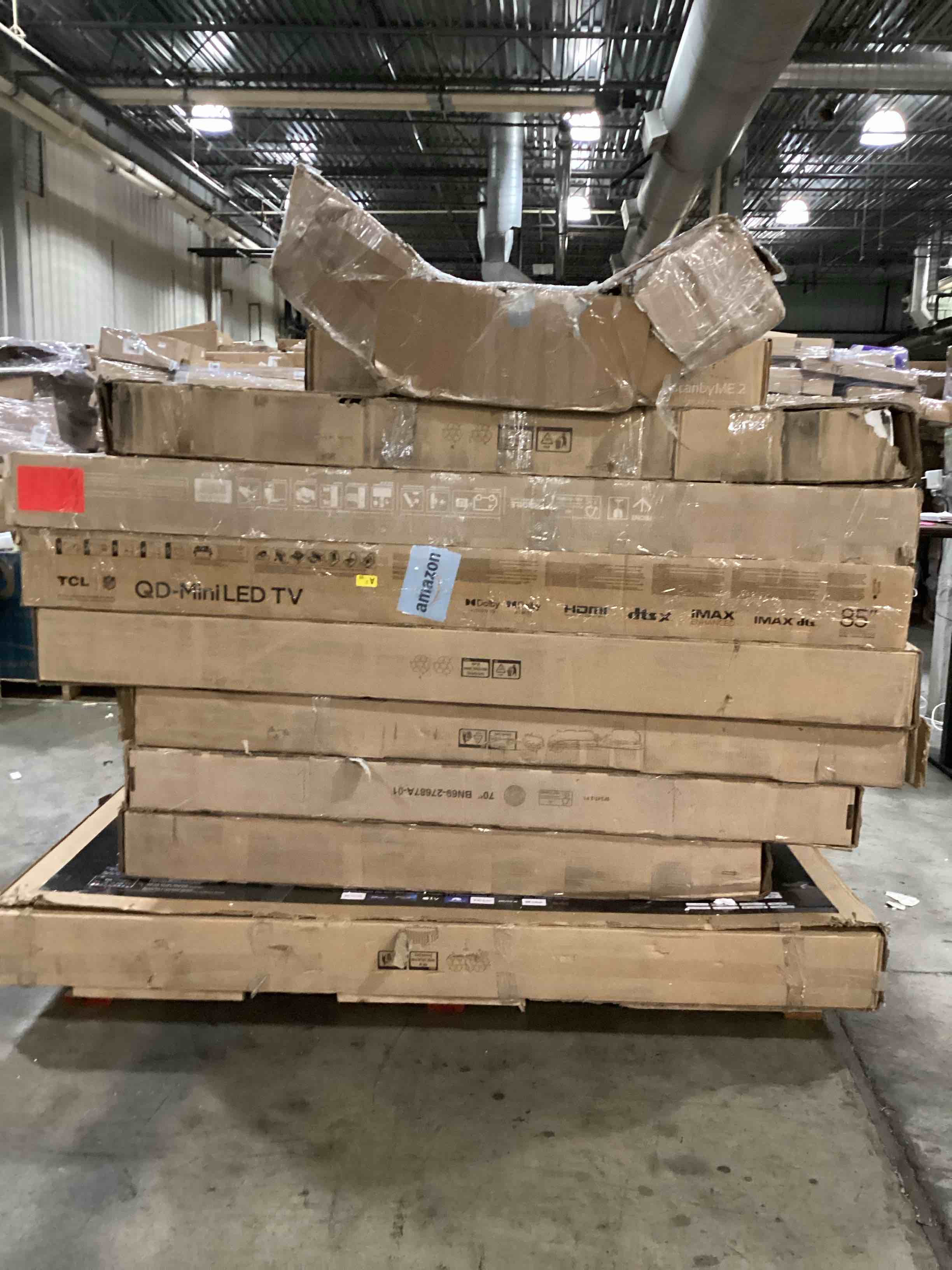 pallet of defective electronics for parts