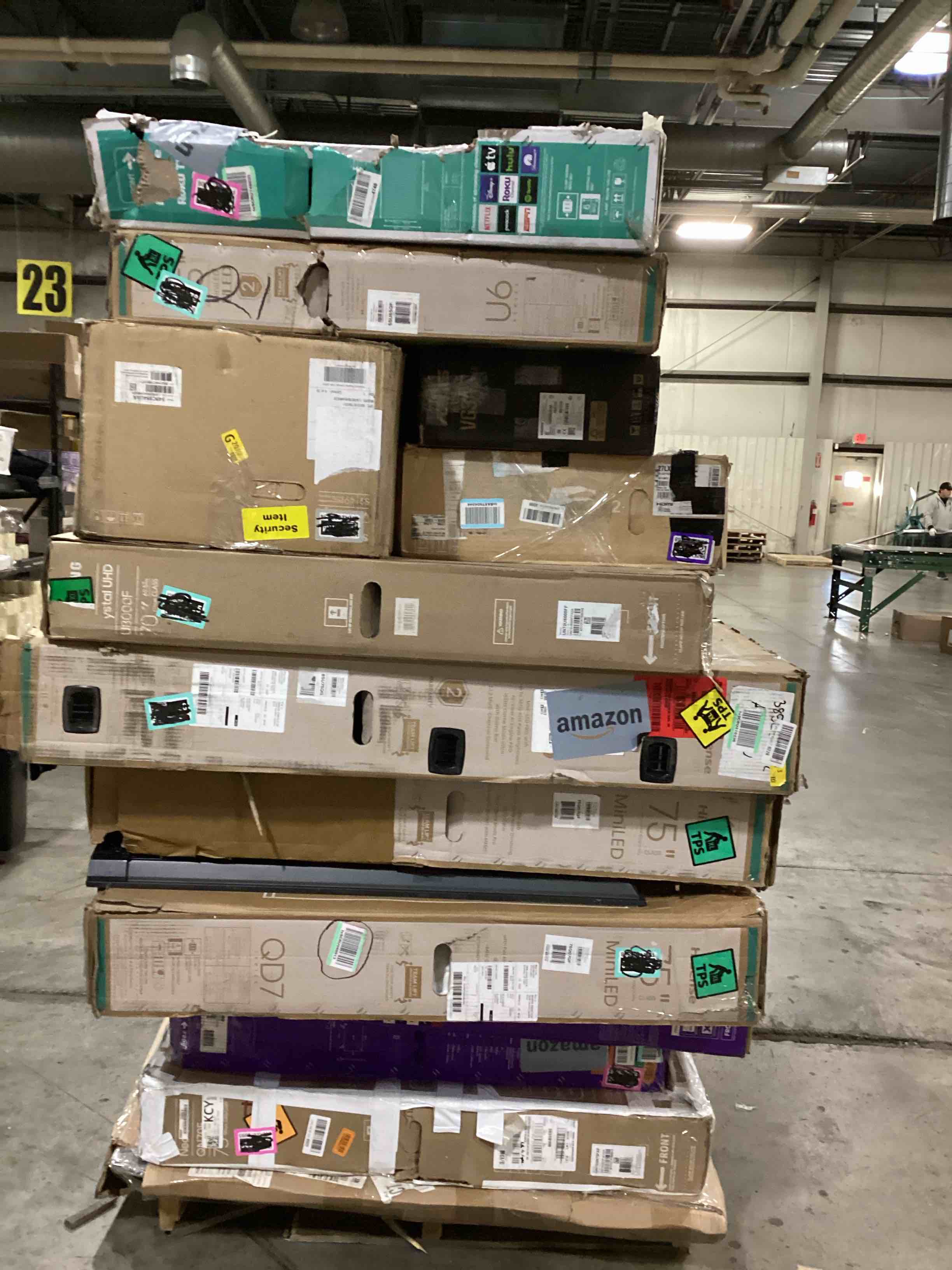 pallet of defective electronics for parts