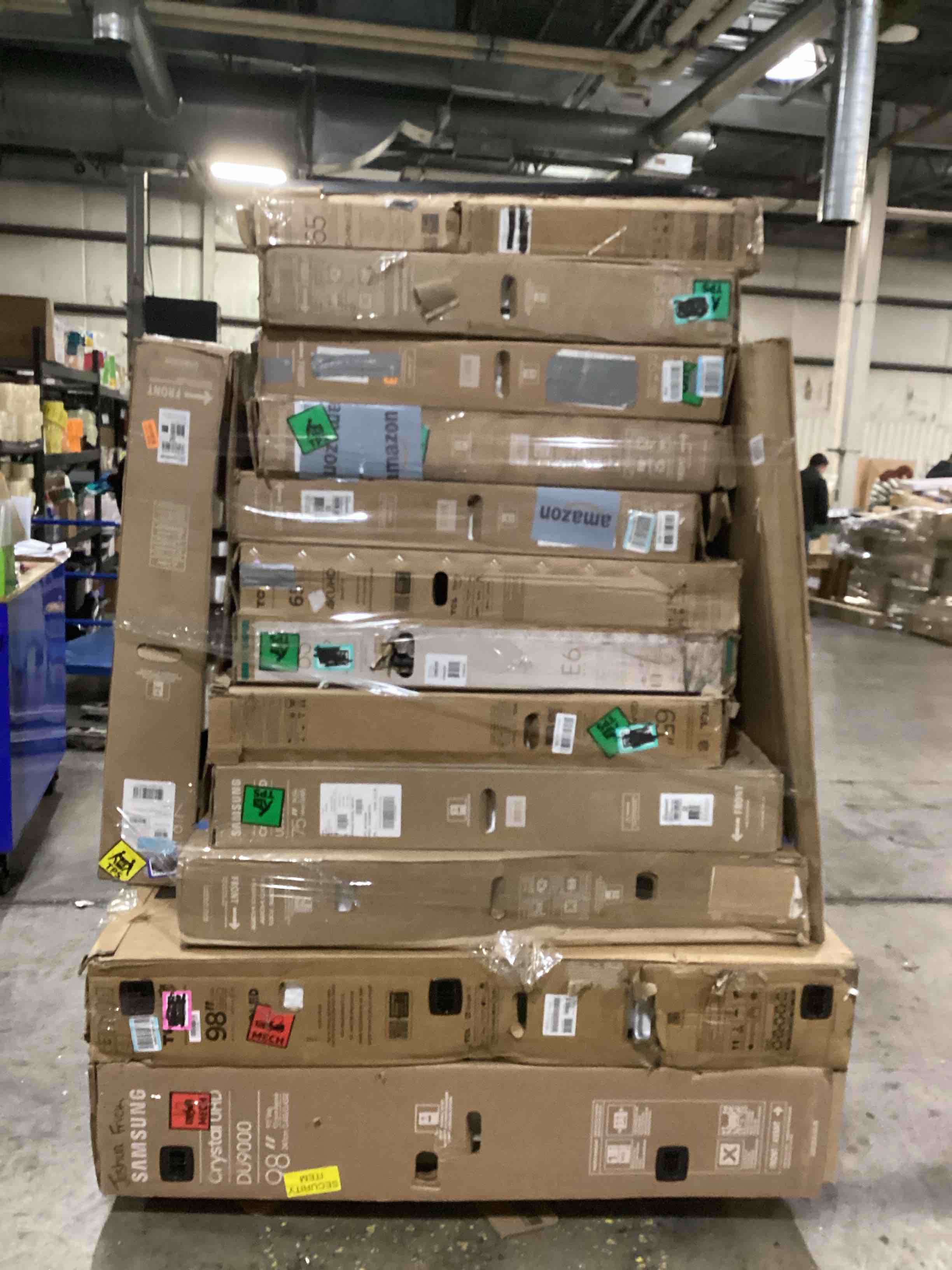 pallet of defective electronics for parts