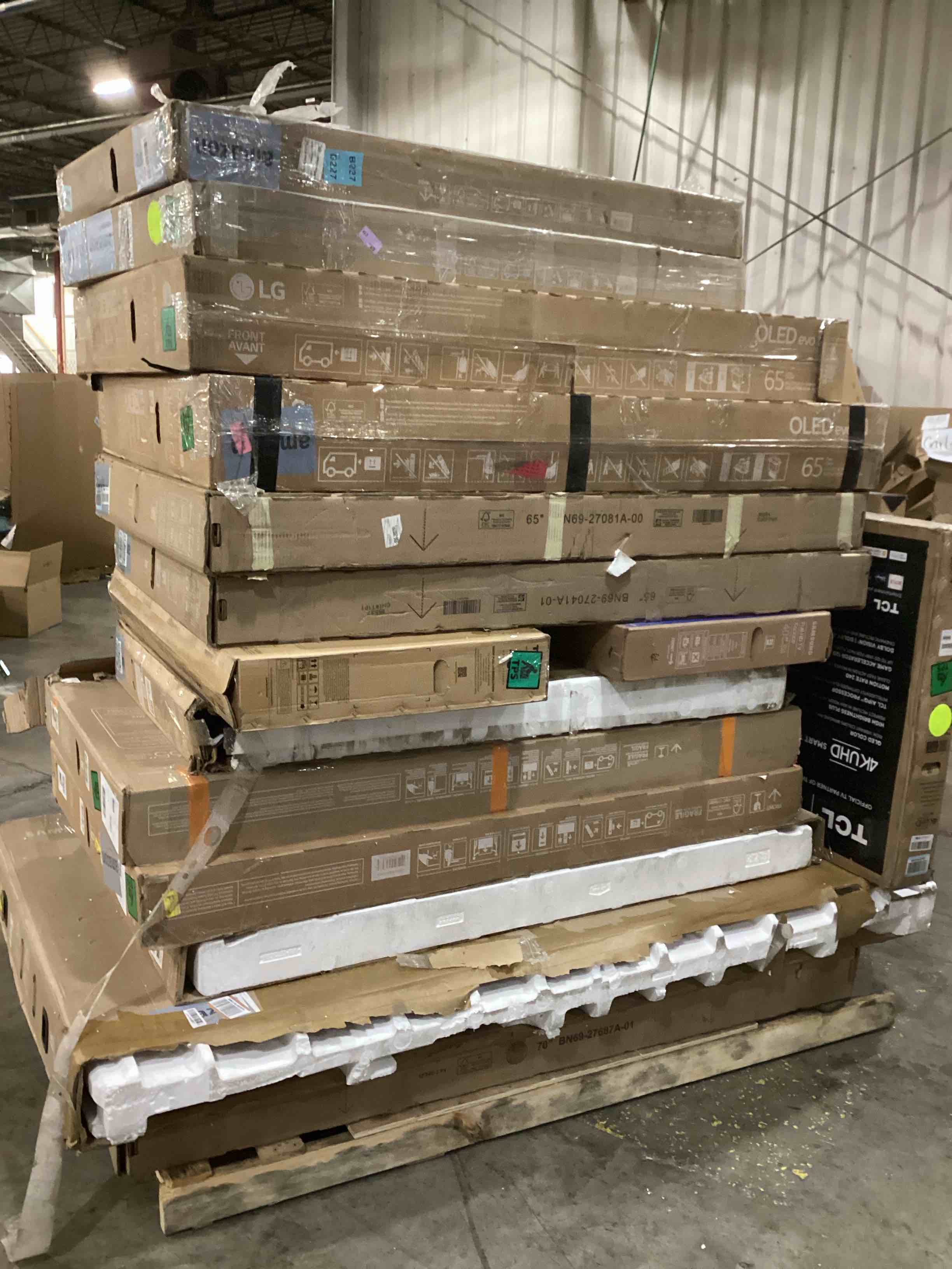 pallet of defective electronics for parts 