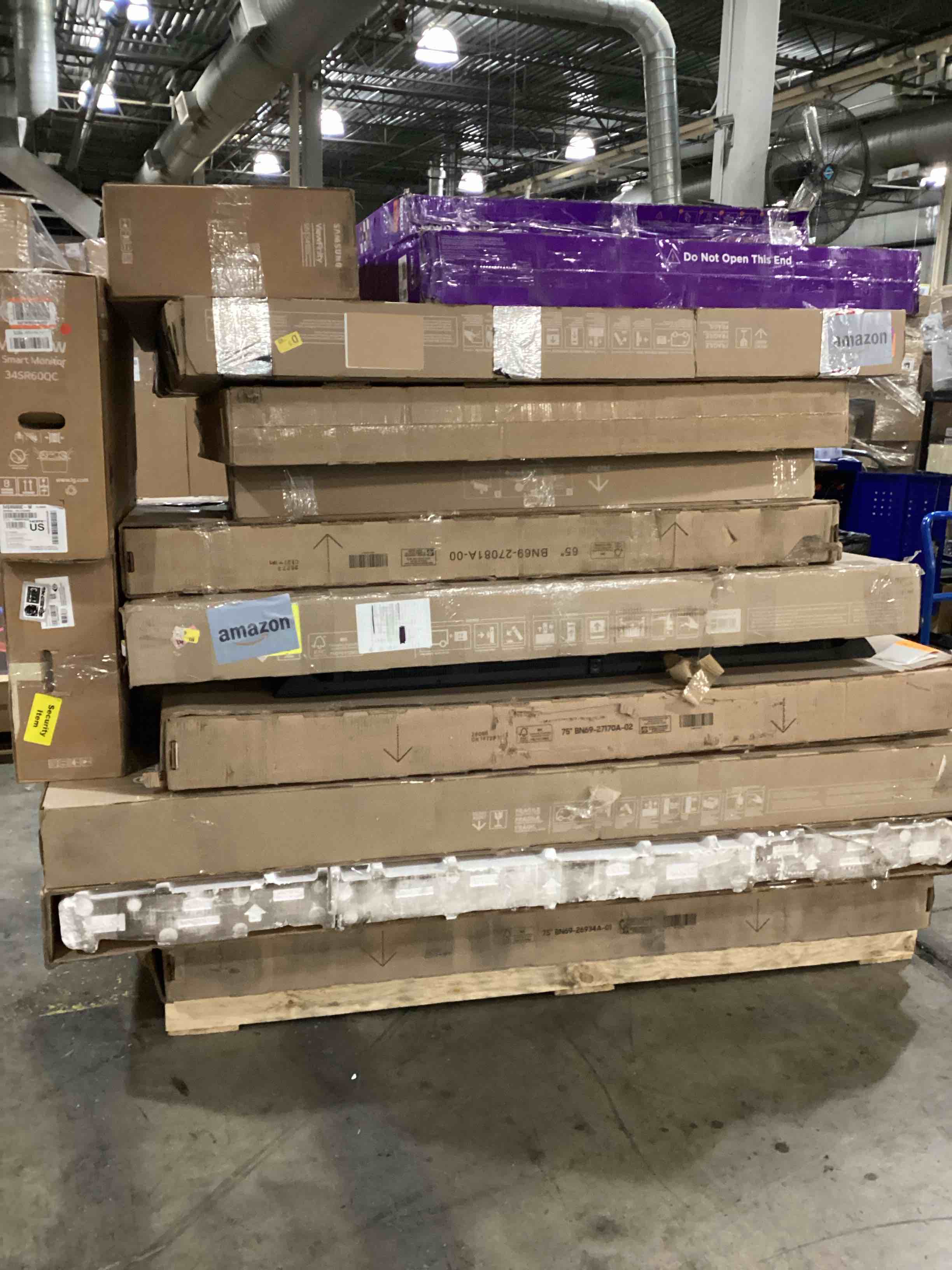 pallet of defective electronics for parts