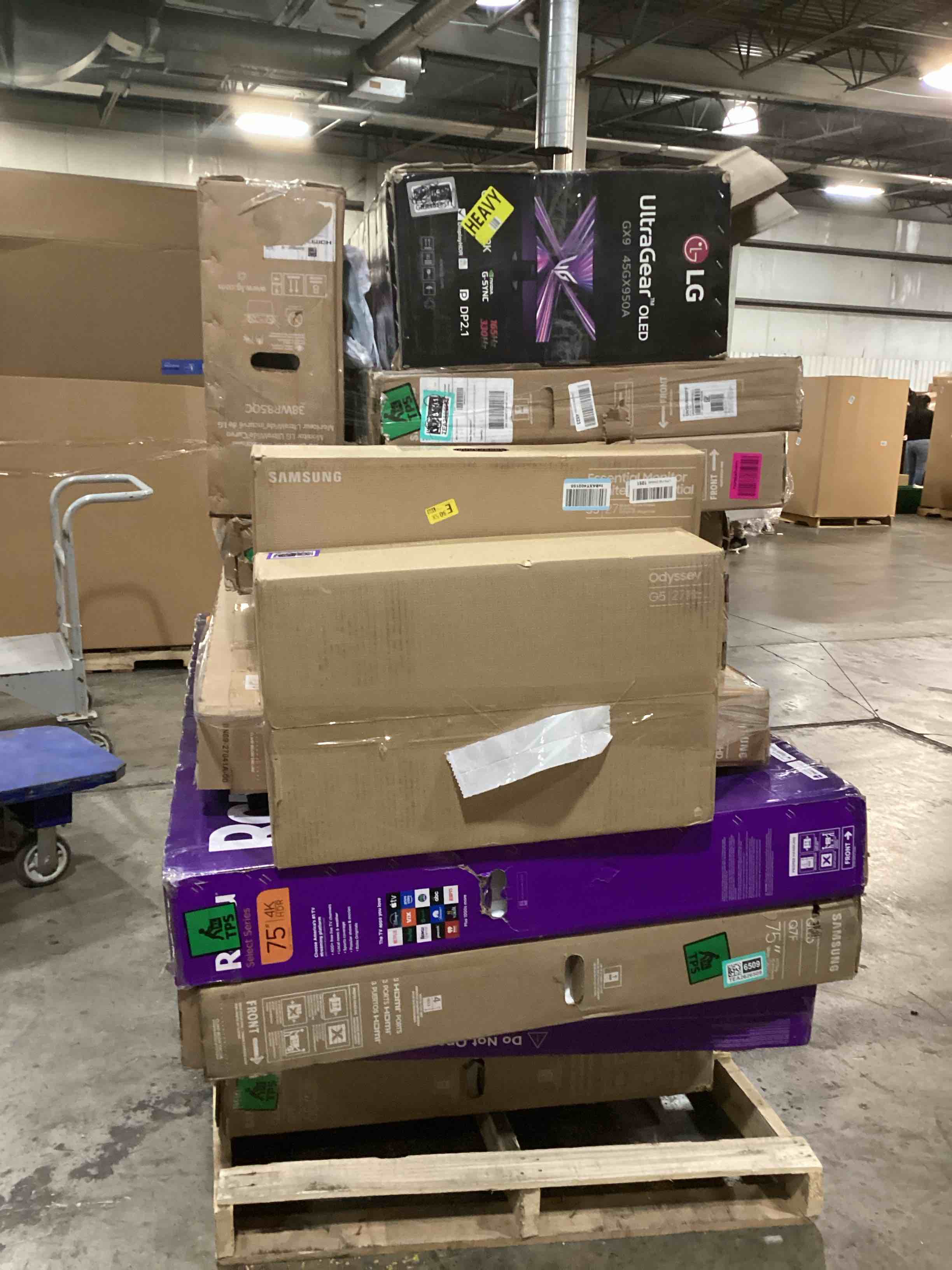 pallet of defective electronics for parts 