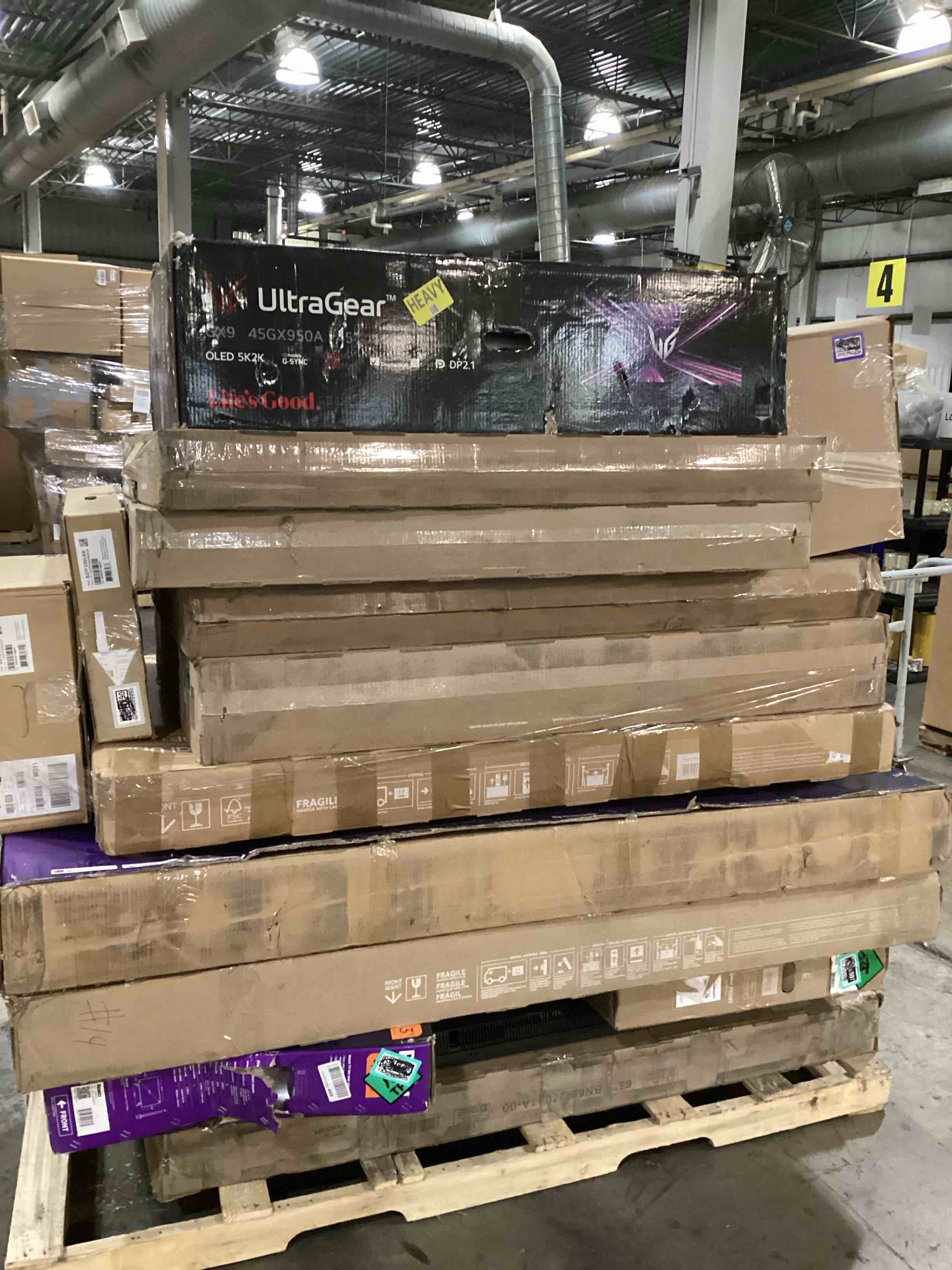 Condition photo showing As Is for pallet of defective electronics for parts