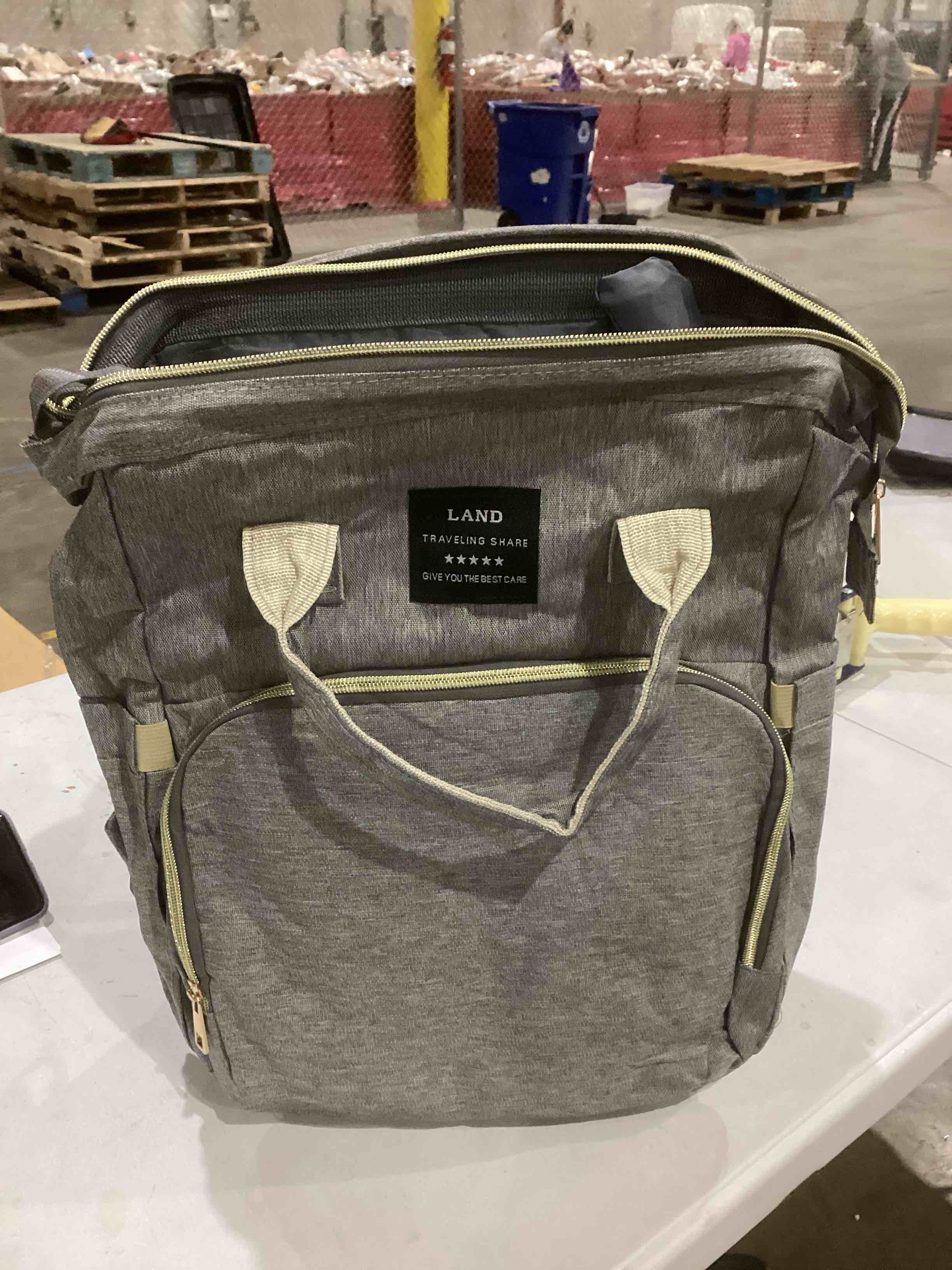 https://s3.amazonaws.com/lotting-images-prod/bidfta/TEA1628296_1741190904596.jpeg