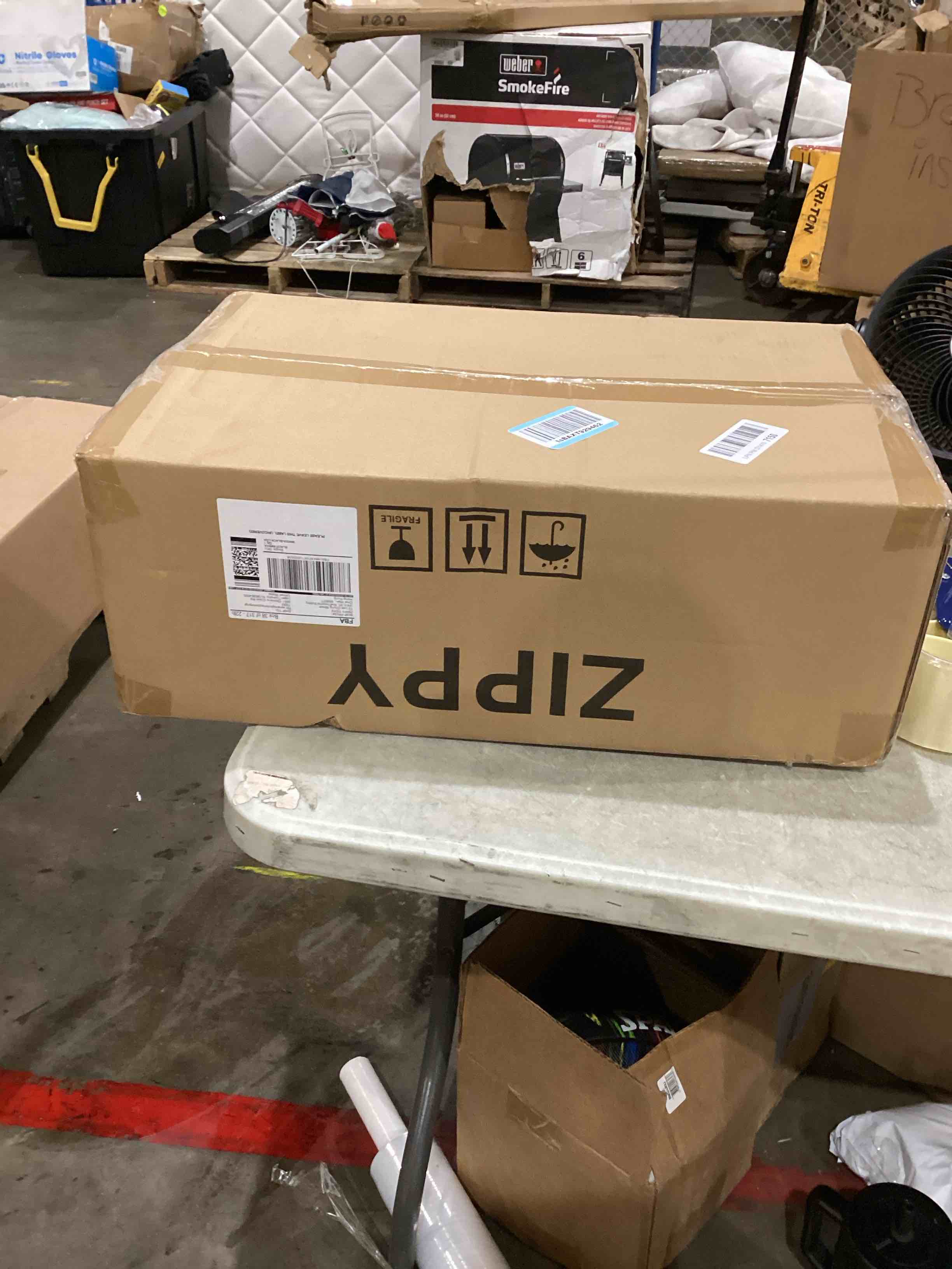 https://s3.amazonaws.com/lotting-images-prod/bidfta/TEA1637392_1750852657609.jpeg