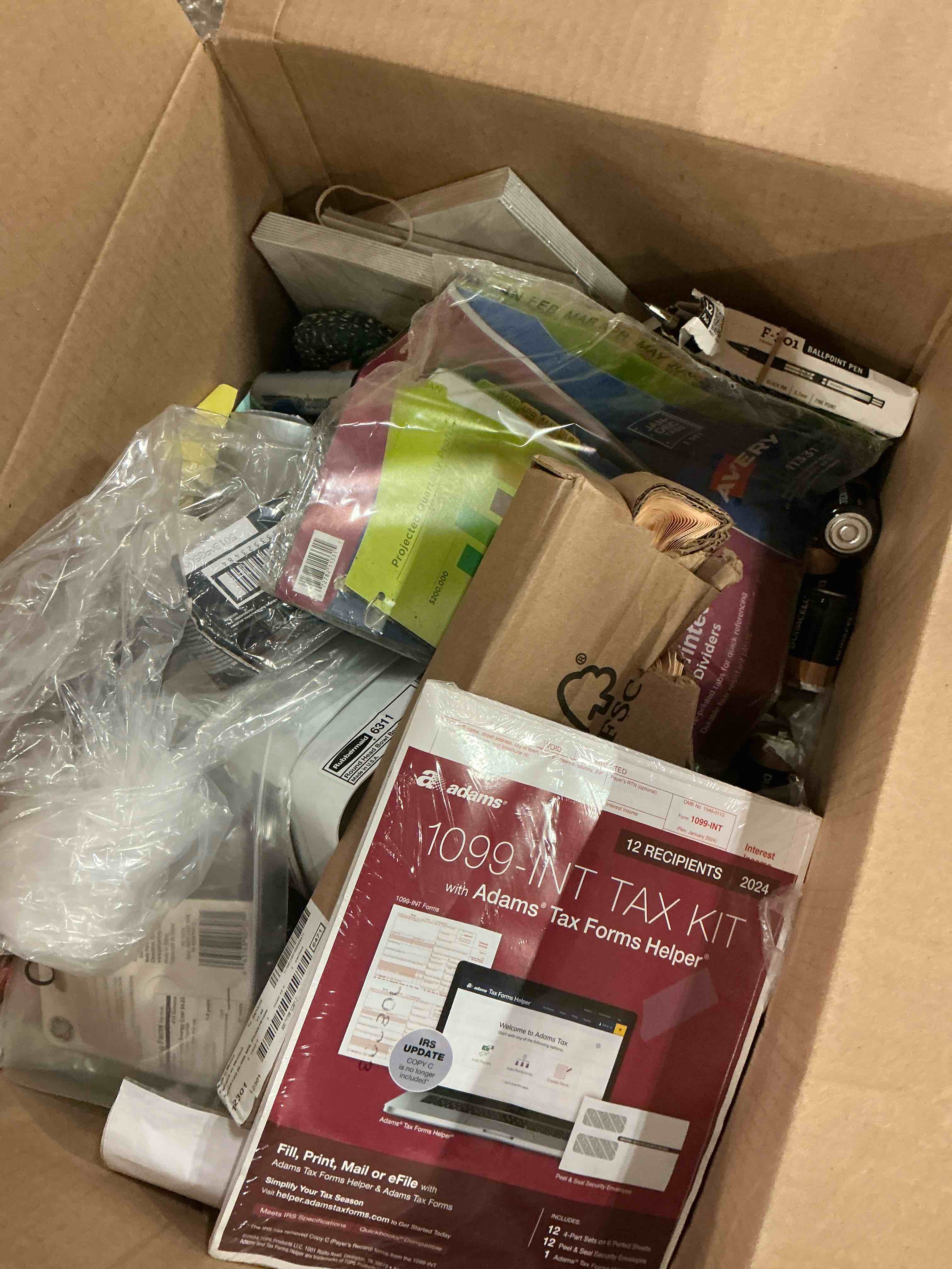 Assortment of cleaning and school supplies and batteries