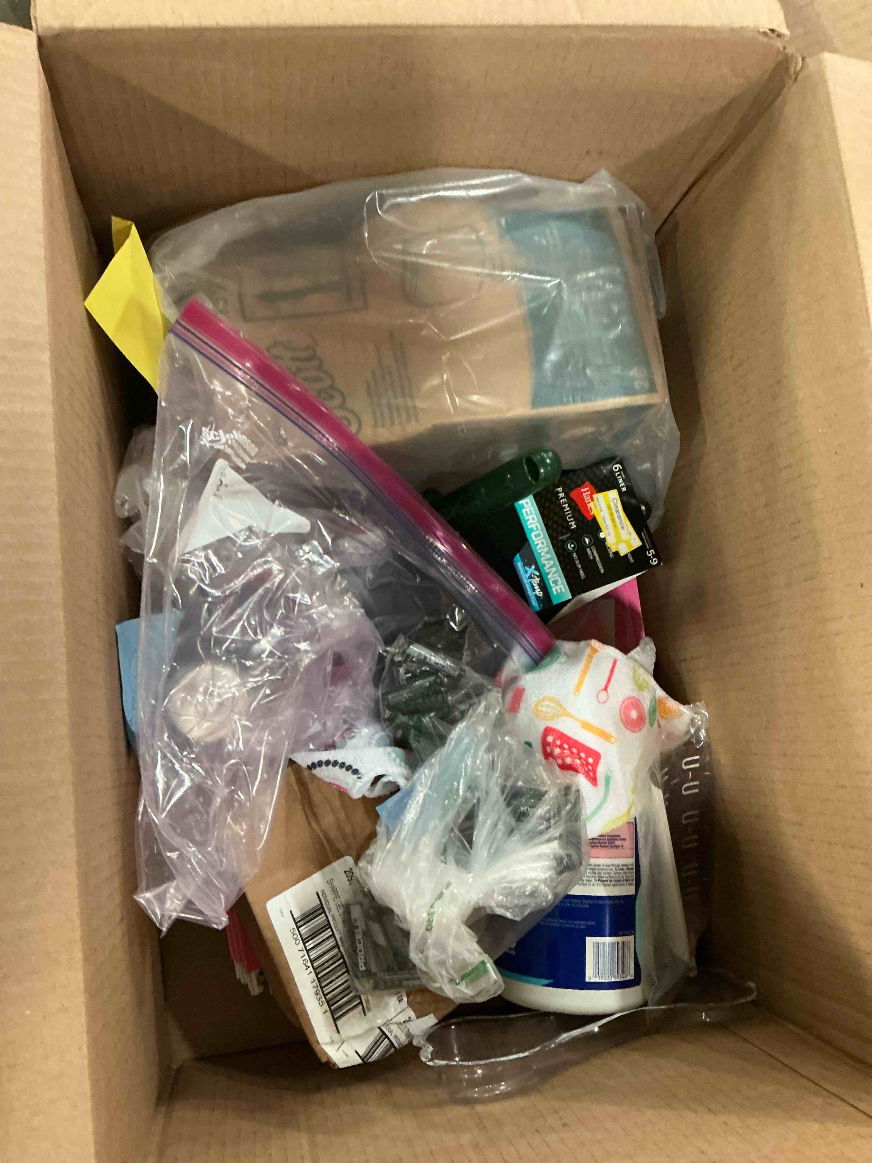 Assortment of cleaning and school supplies and batteries