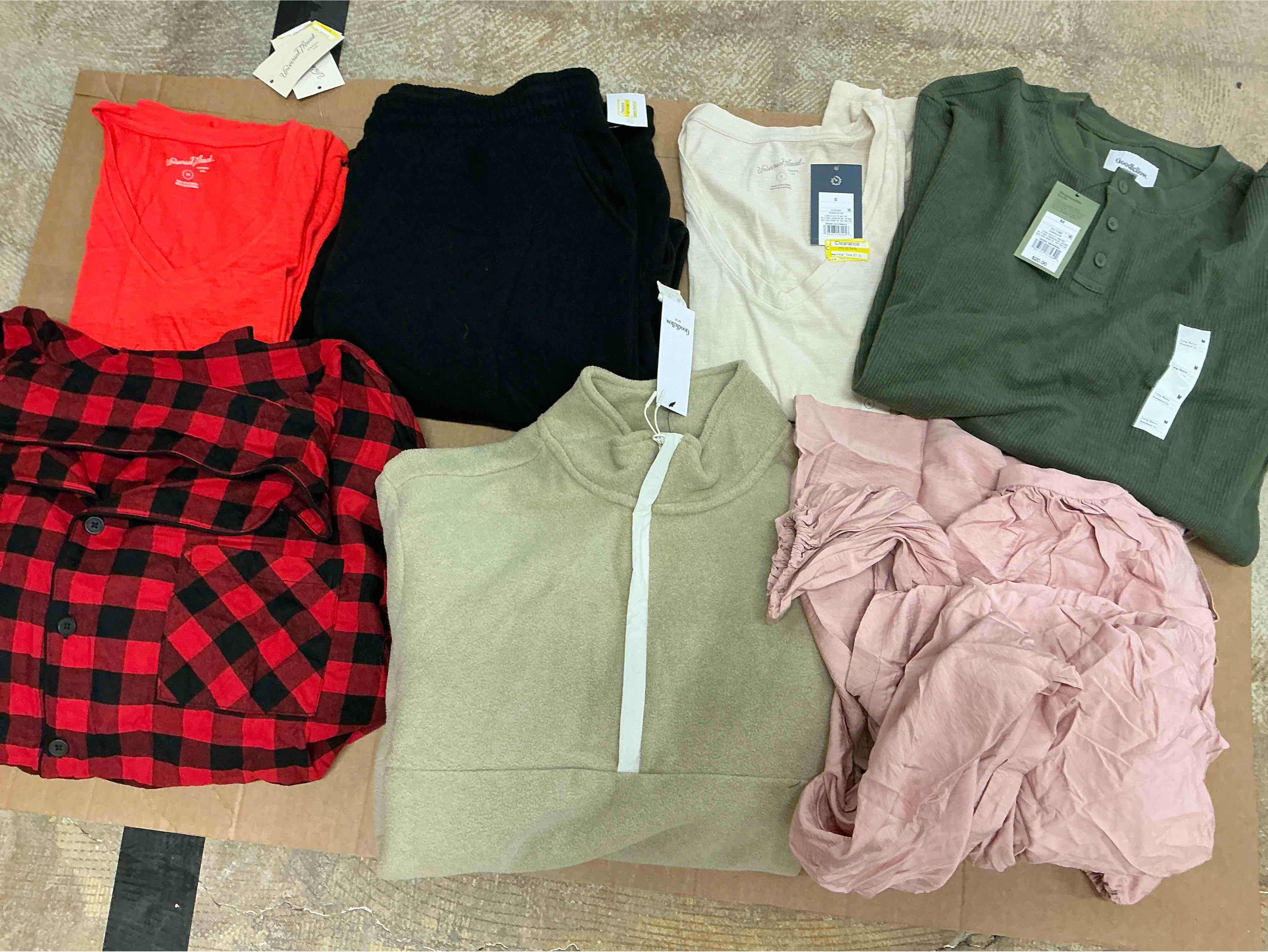 Assortment of winter and summer clothes of different size and style (30 pieces)