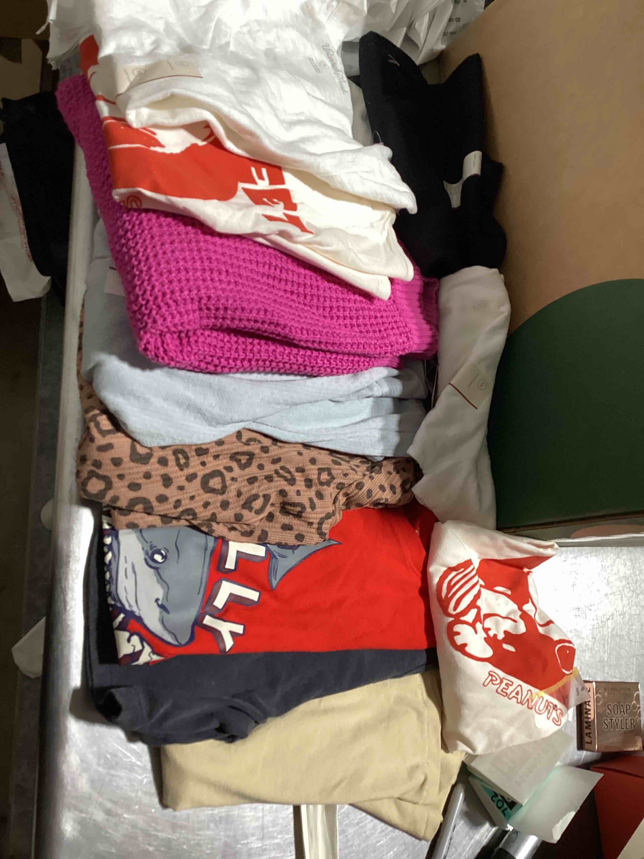 Assorted lot of various clothing such as shorts,pants,skirts and shirts,tank tops and so much…