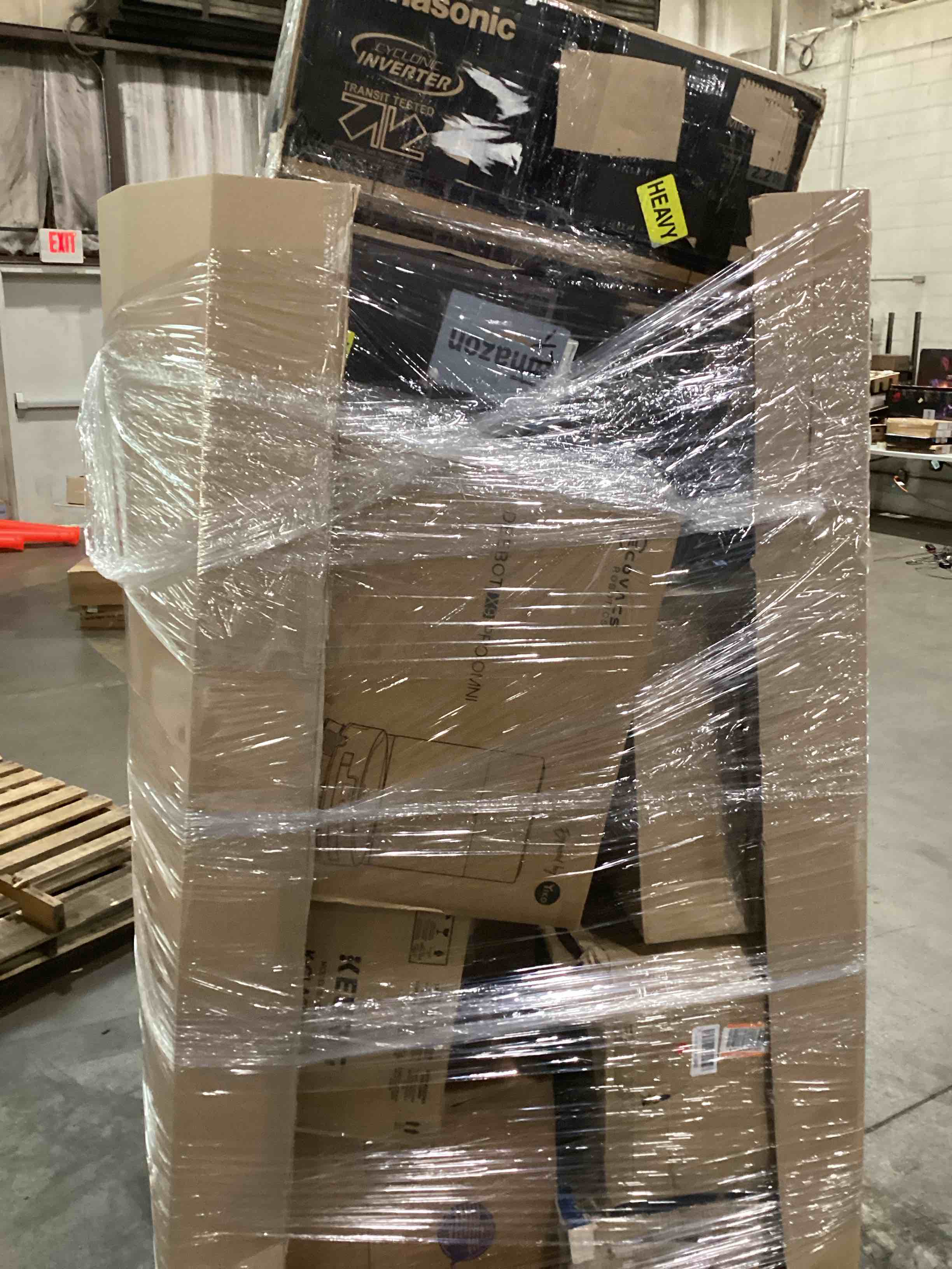 pallet of damaged assorted appliances 