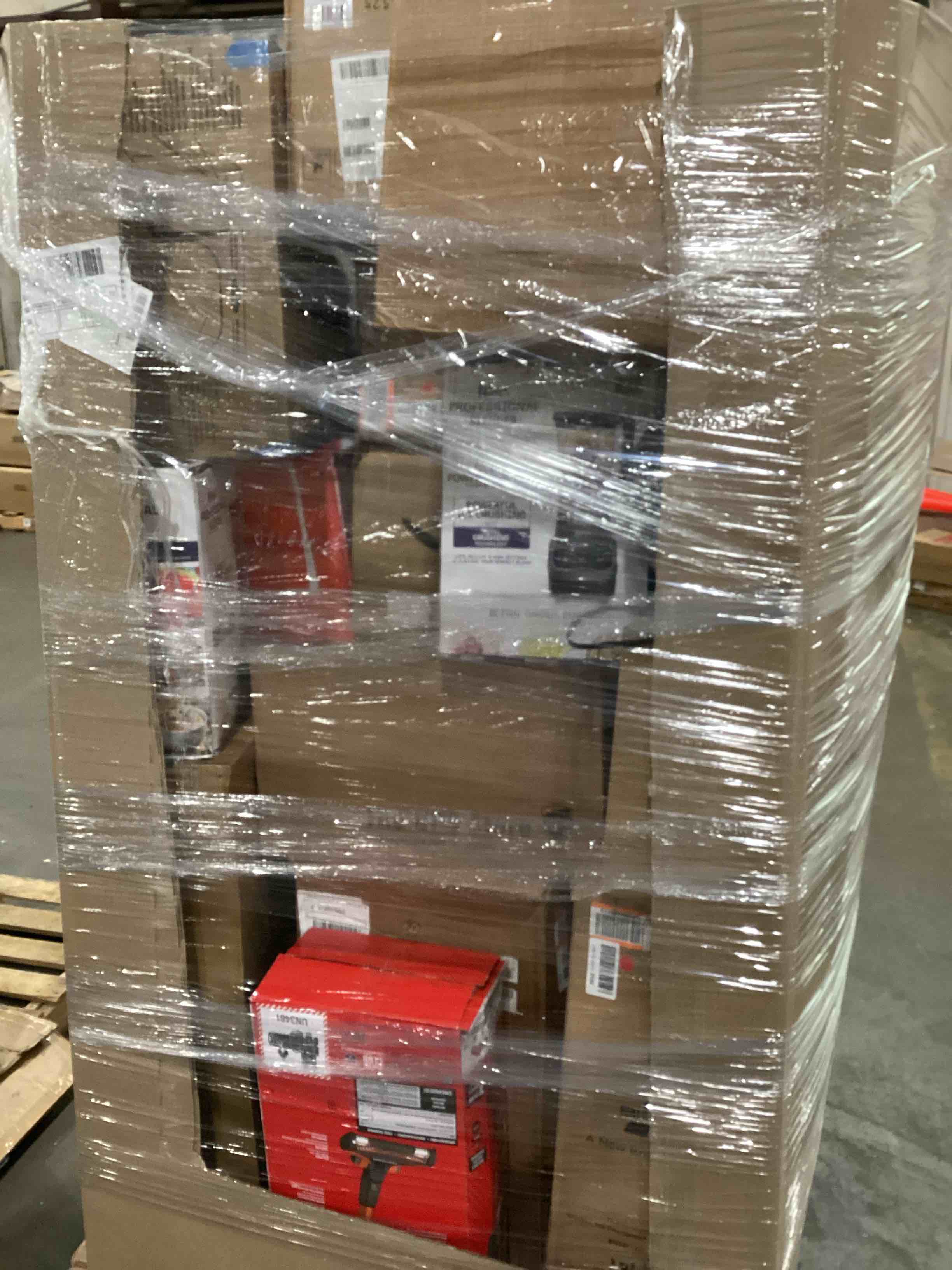 pallet of damaged assorted appliances
