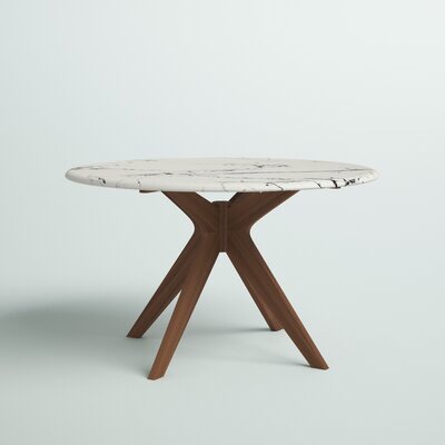 Mercury Row White Faux Versilia dining table natural wood legs 