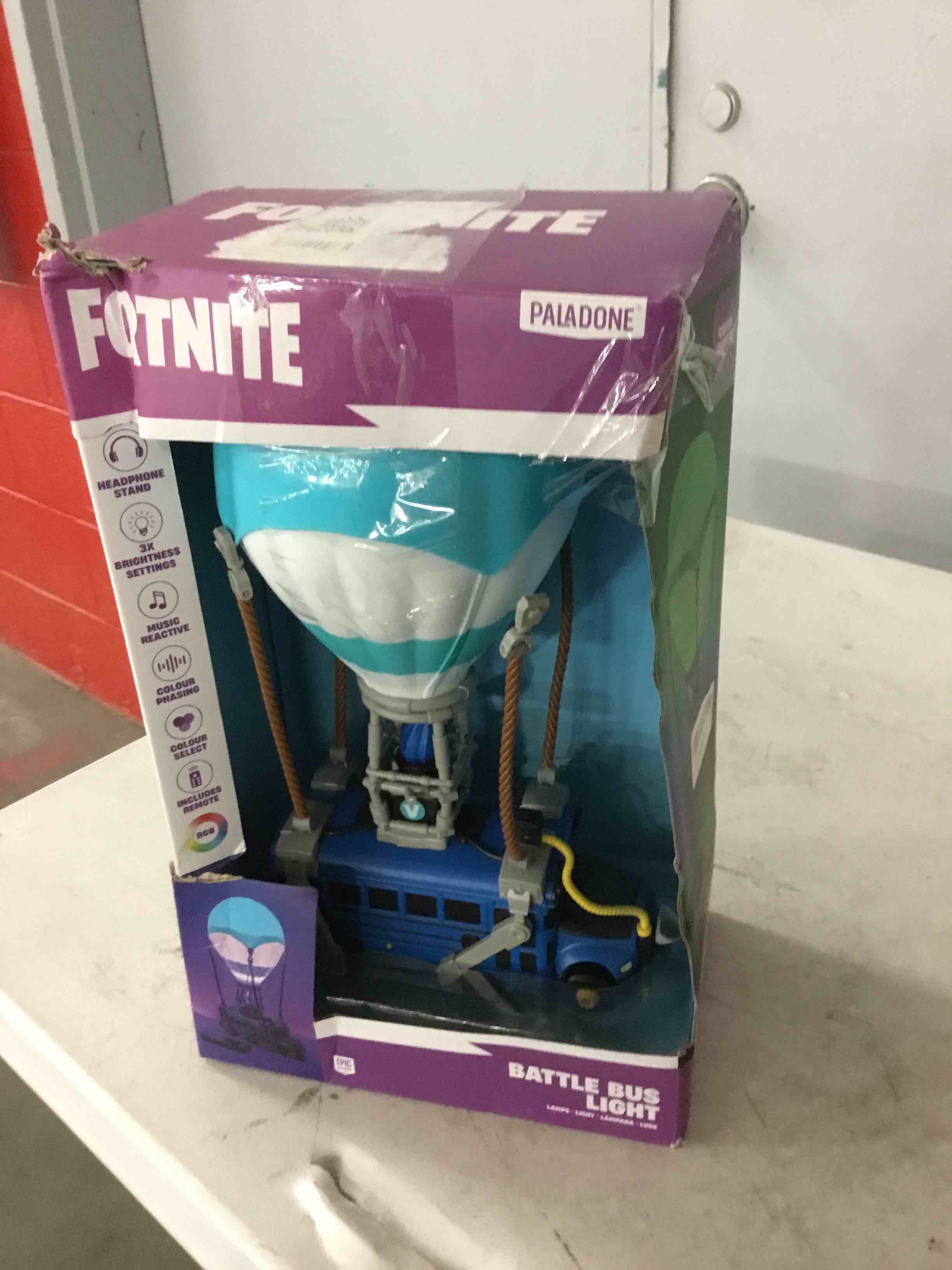 Condition photo showing As Is for paladone fortnite battle bus light, officially licensed color changing led gaming lamp with headphone stand for gamer rooms, bedrooms, homes, gift idea