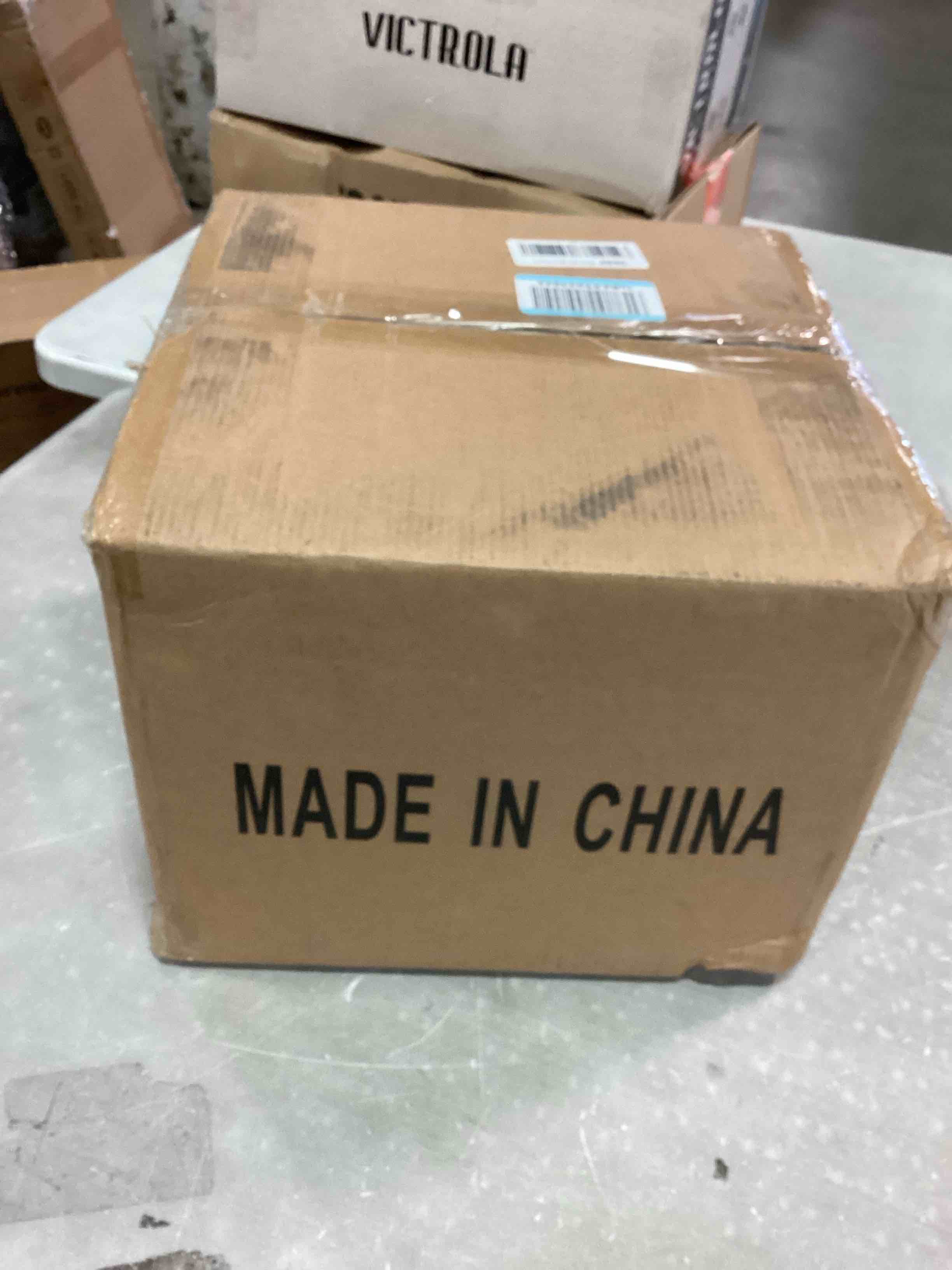 https://s3.amazonaws.com/lotting-images-prod/bidfta/TEA1919051_1735661855117.jpeg