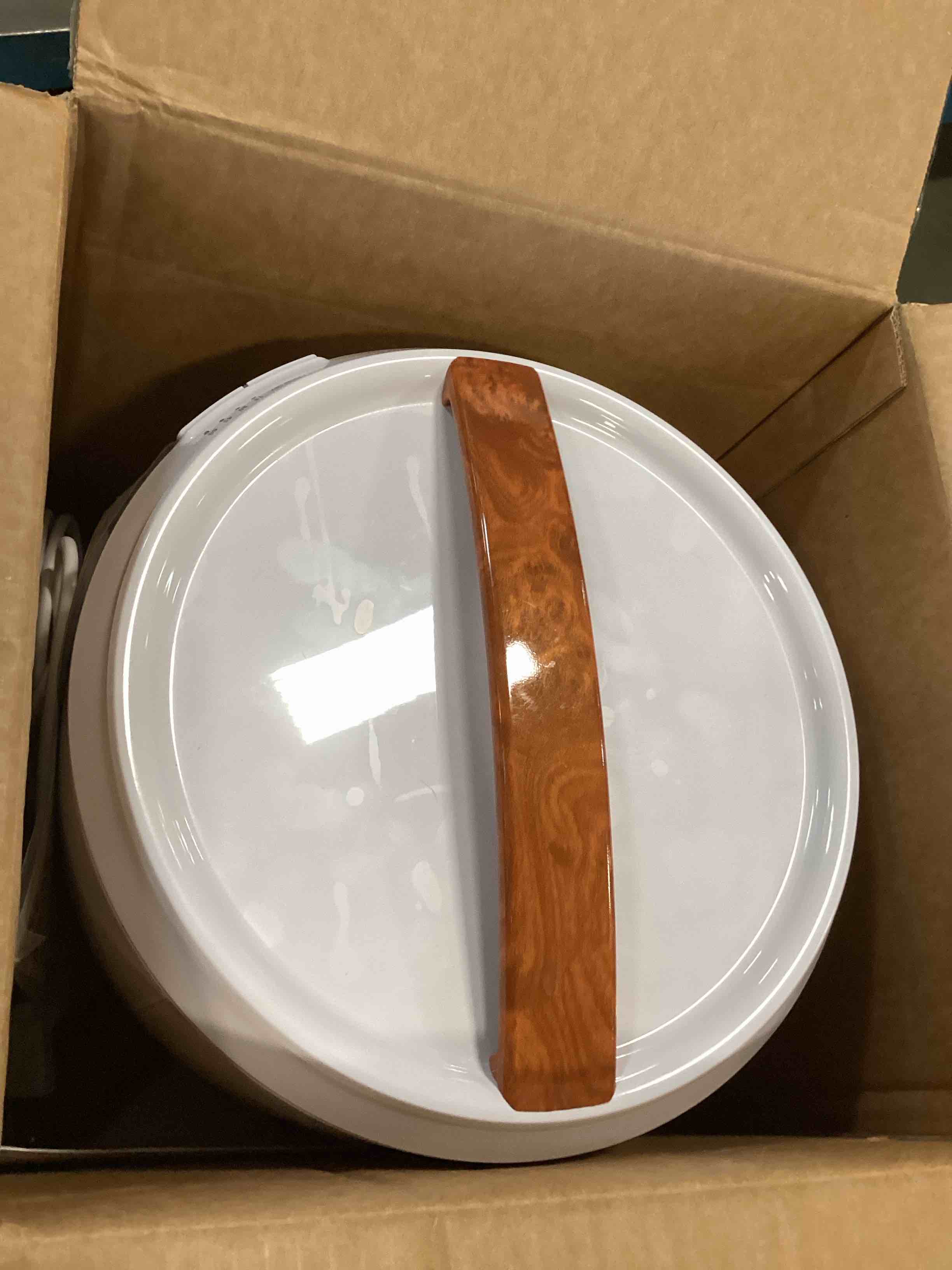 https://s3.amazonaws.com/lotting-images-prod/bidfta/TEA1919291_1735843414584.jpeg