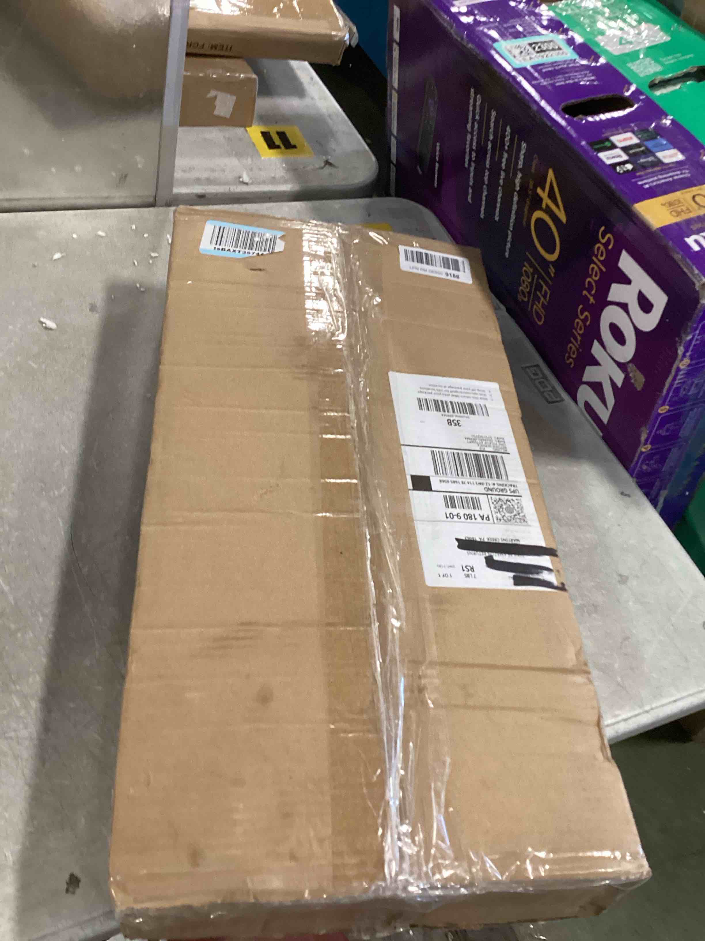 https://s3.amazonaws.com/lotting-images-prod/bidfta/TEA1922323_1736782179020.jpeg