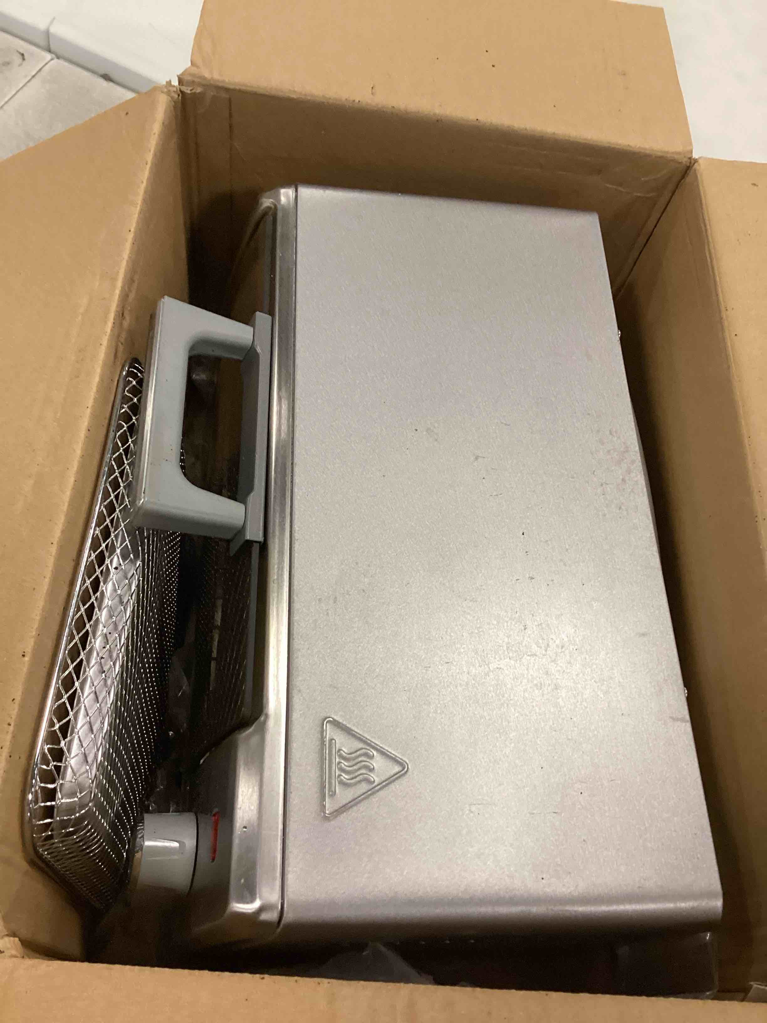 https://s3.amazonaws.com/lotting-images-prod/bidfta/TEA1941040_1747407217751.jpeg