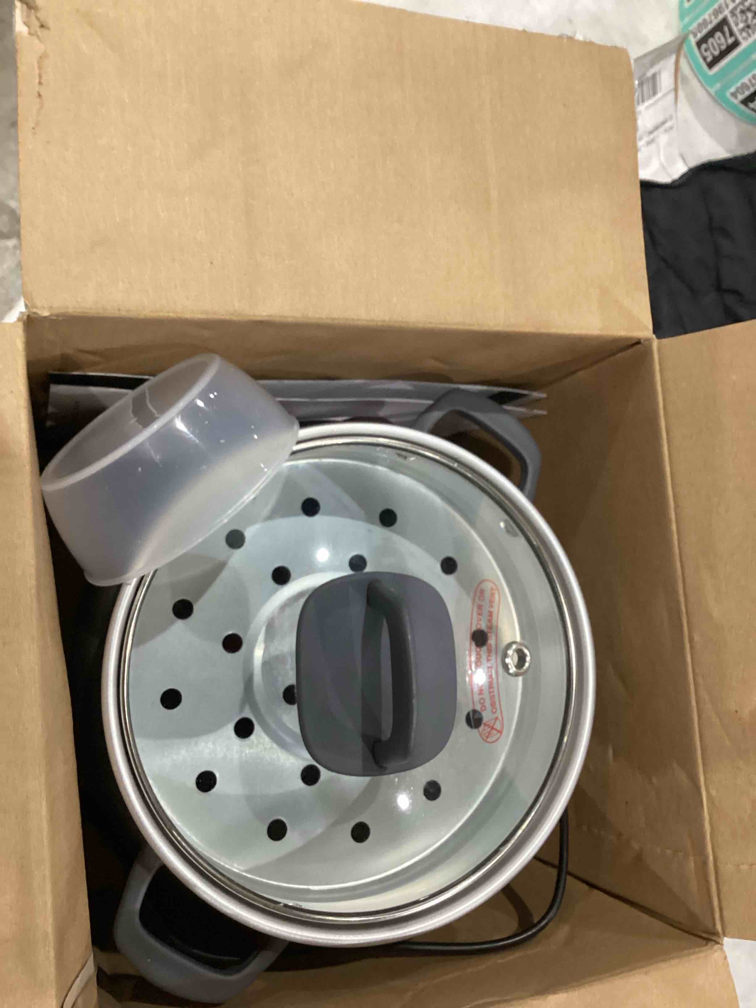 https://s3.amazonaws.com/lotting-images-prod/bidfta/TEA1967598_1759154521851.jpeg