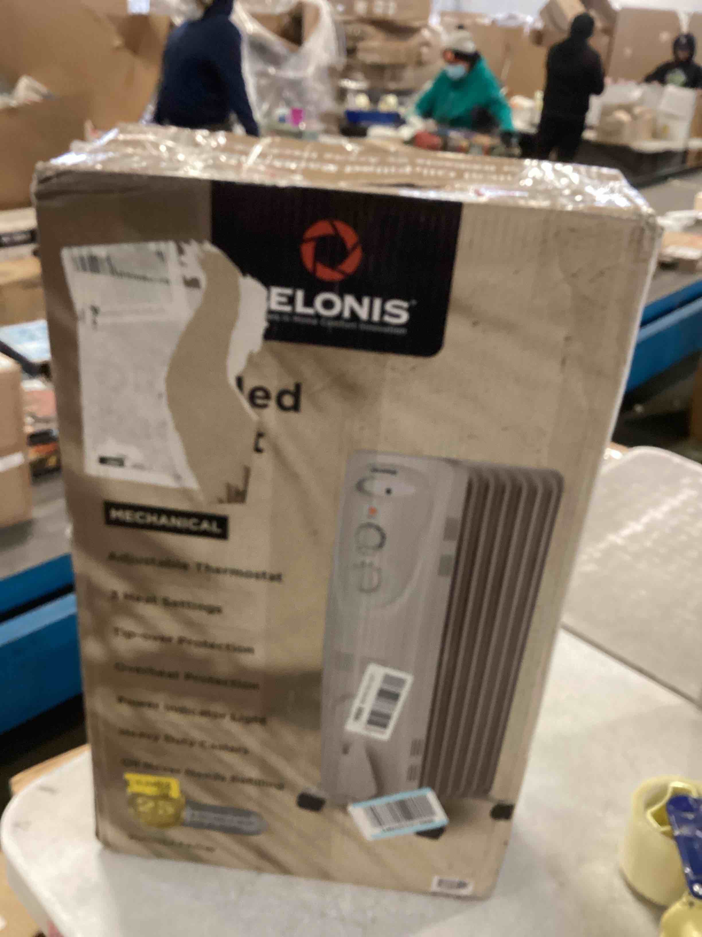 https://s3.amazonaws.com/lotting-images-prod/bidfta/TEA2097388_1737650291218.jpeg