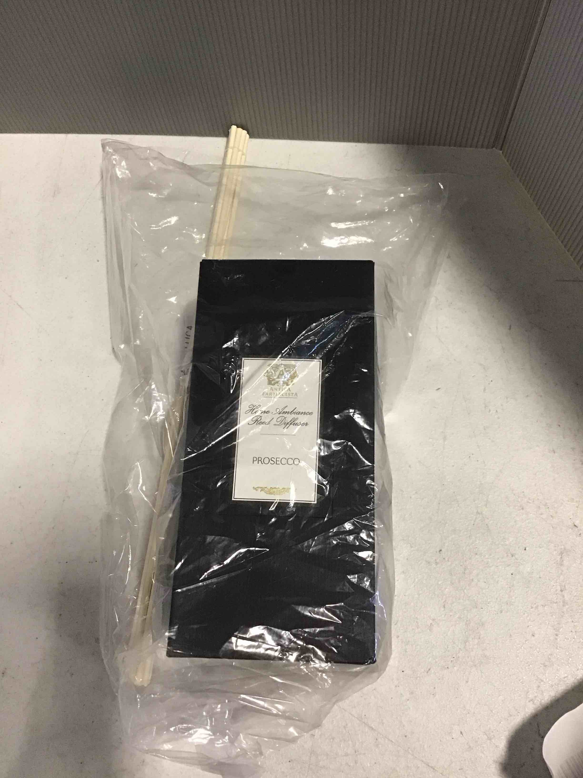 https://s3.amazonaws.com/lotting-images-prod/bidfta/TEA2128203_1744815035599.jpeg
