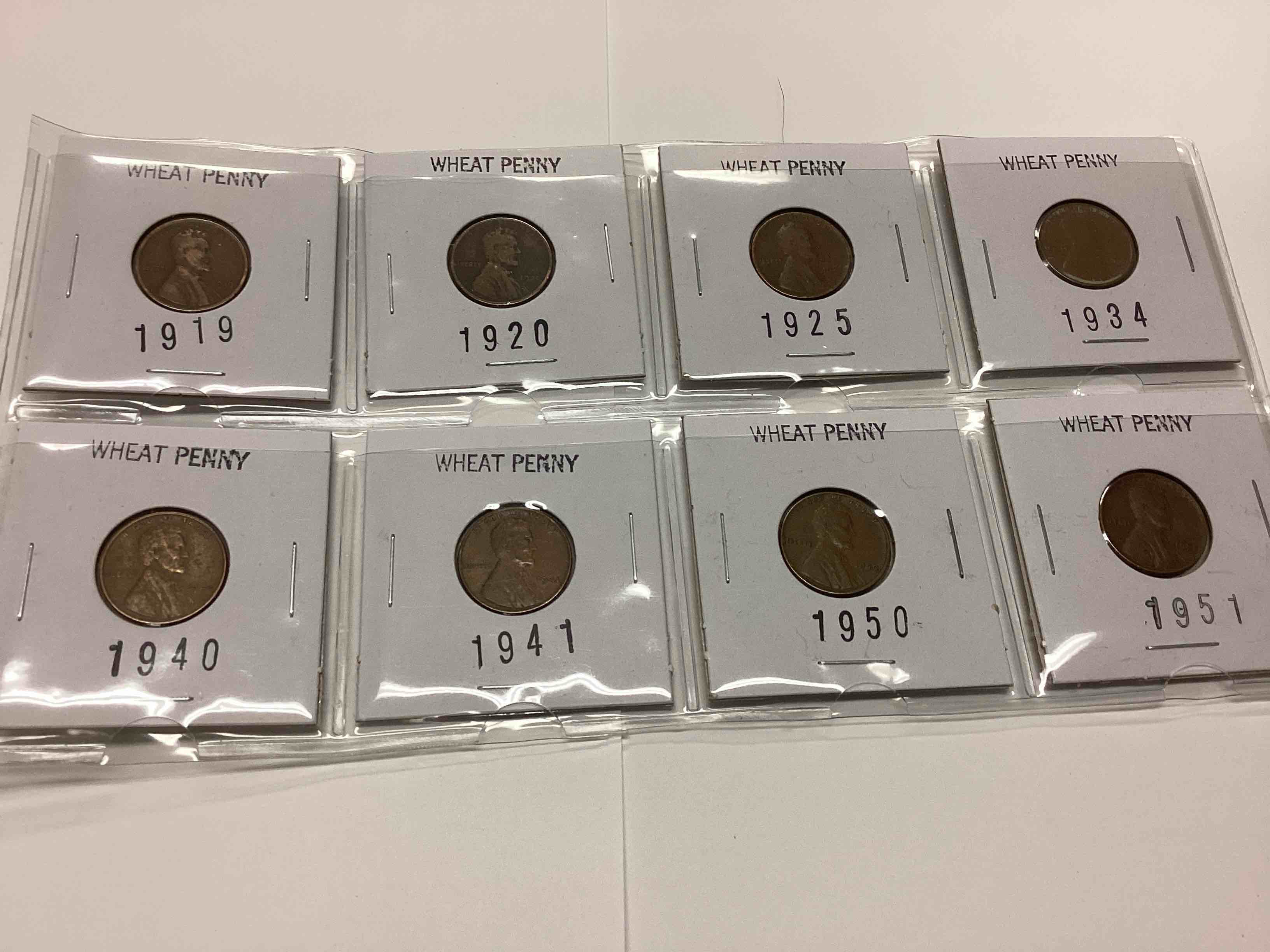 8 Wheat Pennies Years Including 1919, 1920, 1925, 1934, 1940, 1941, 1950 and 1950.
