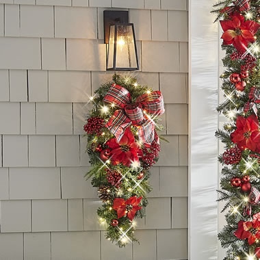 The Cordless Prelit Poinsettia And Ribbon Holiday Trim