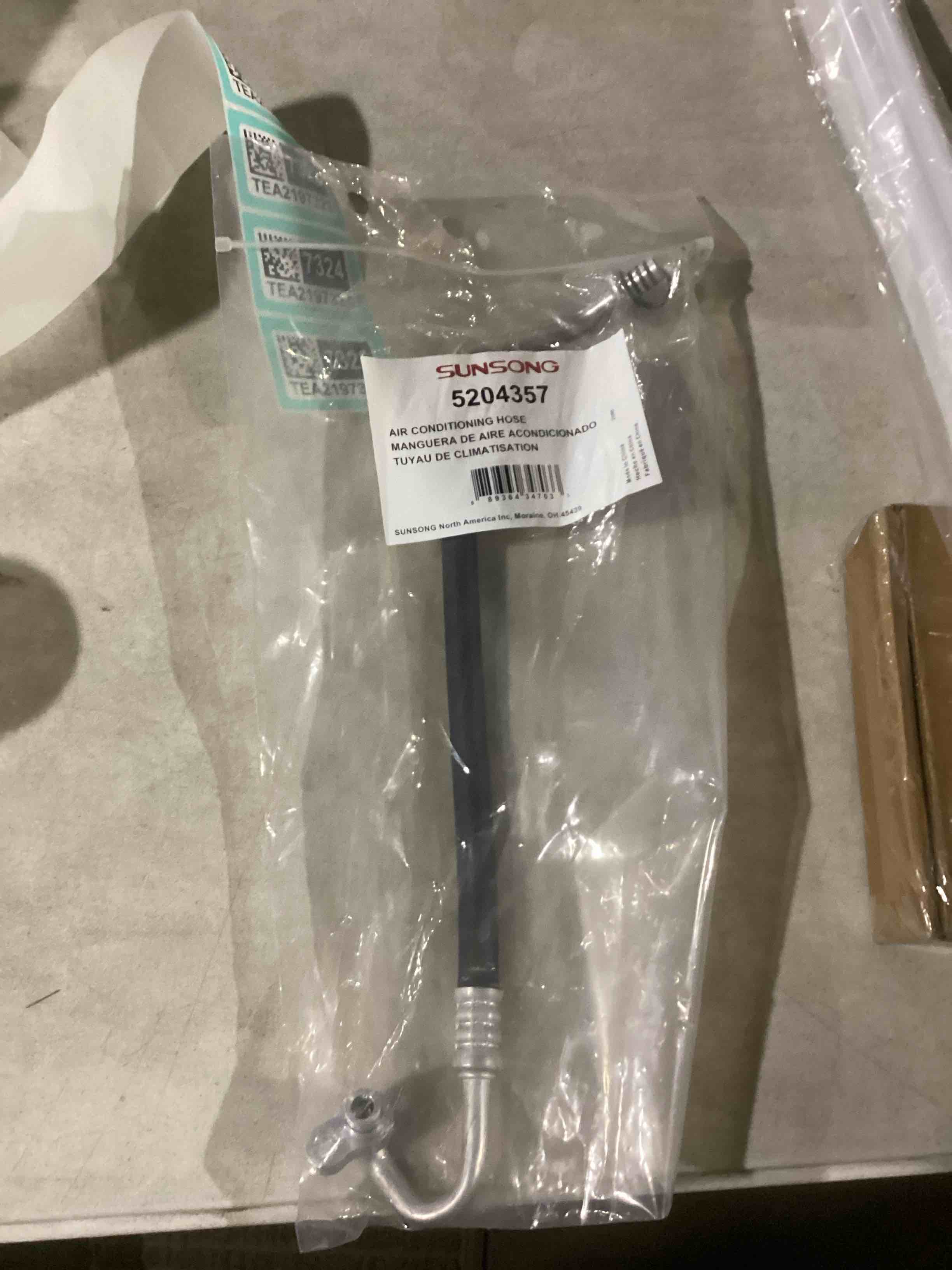 Condition photo showing Good Condition for Sunsong 5204357 AC Discharge Line Performance A/C Hose Line Assembly Exceeding OEM Form, Fit, and Function and Includes Required Gaskets, O-rings, and Seals