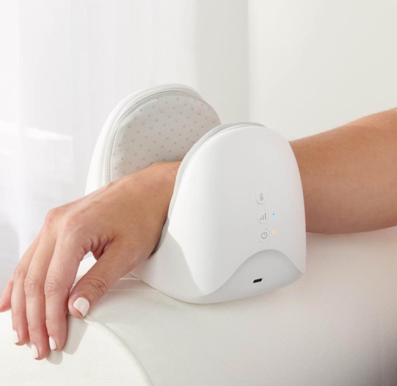 The Cordless Air Compression Wrist Massager