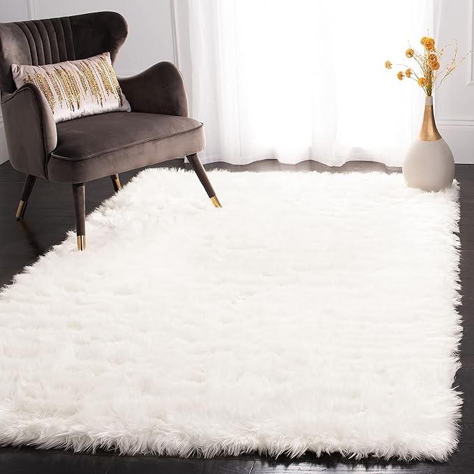 SAFAVIEH Faux Sheep Skin Collection 5’x7’ (needed cleaning)