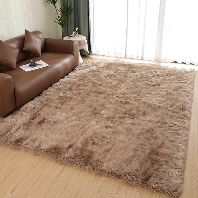 Malaiah Handmade Shag Faux Sheepskin Area Rug in Beige