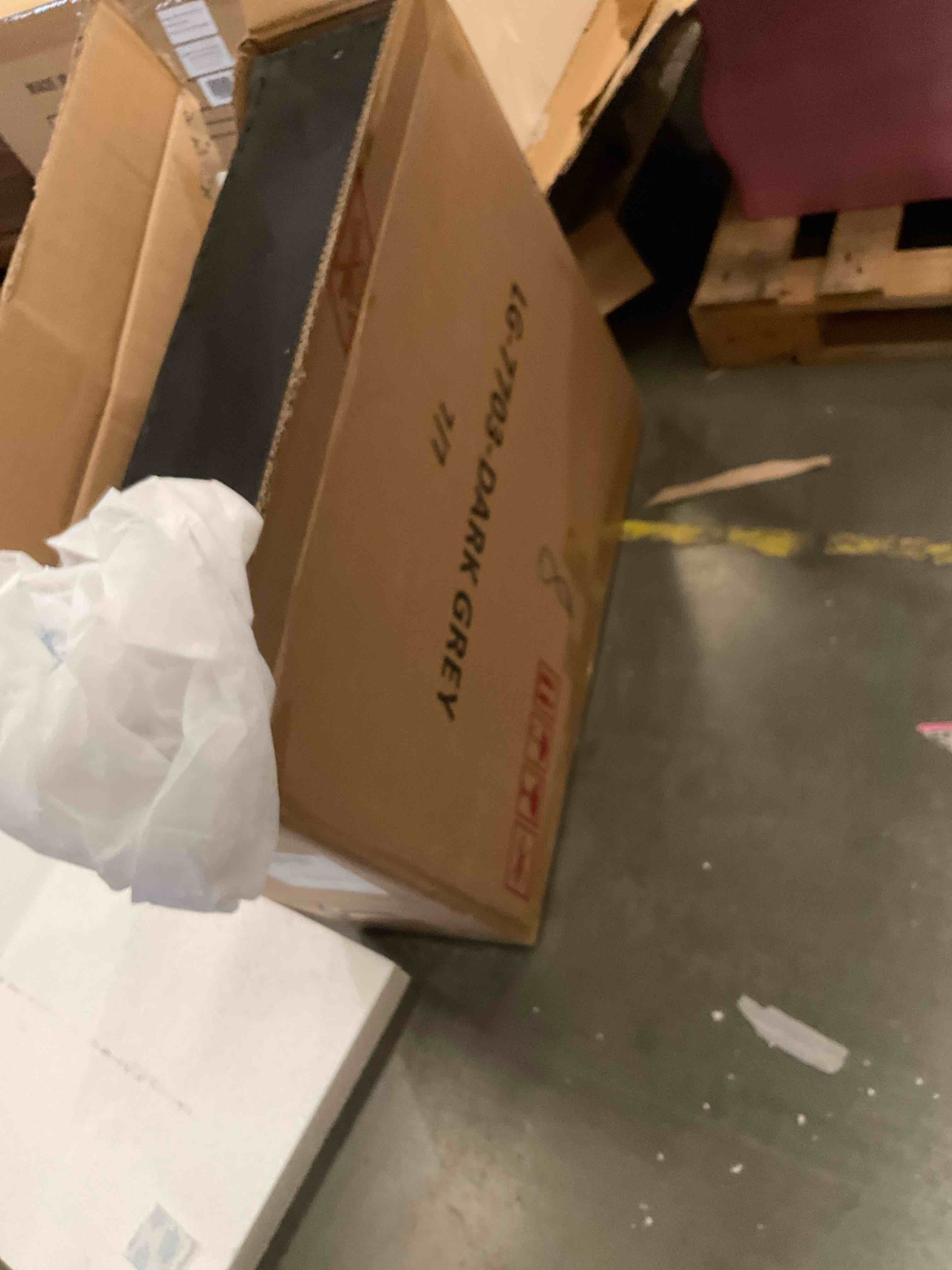 Dark grey sofa armrest