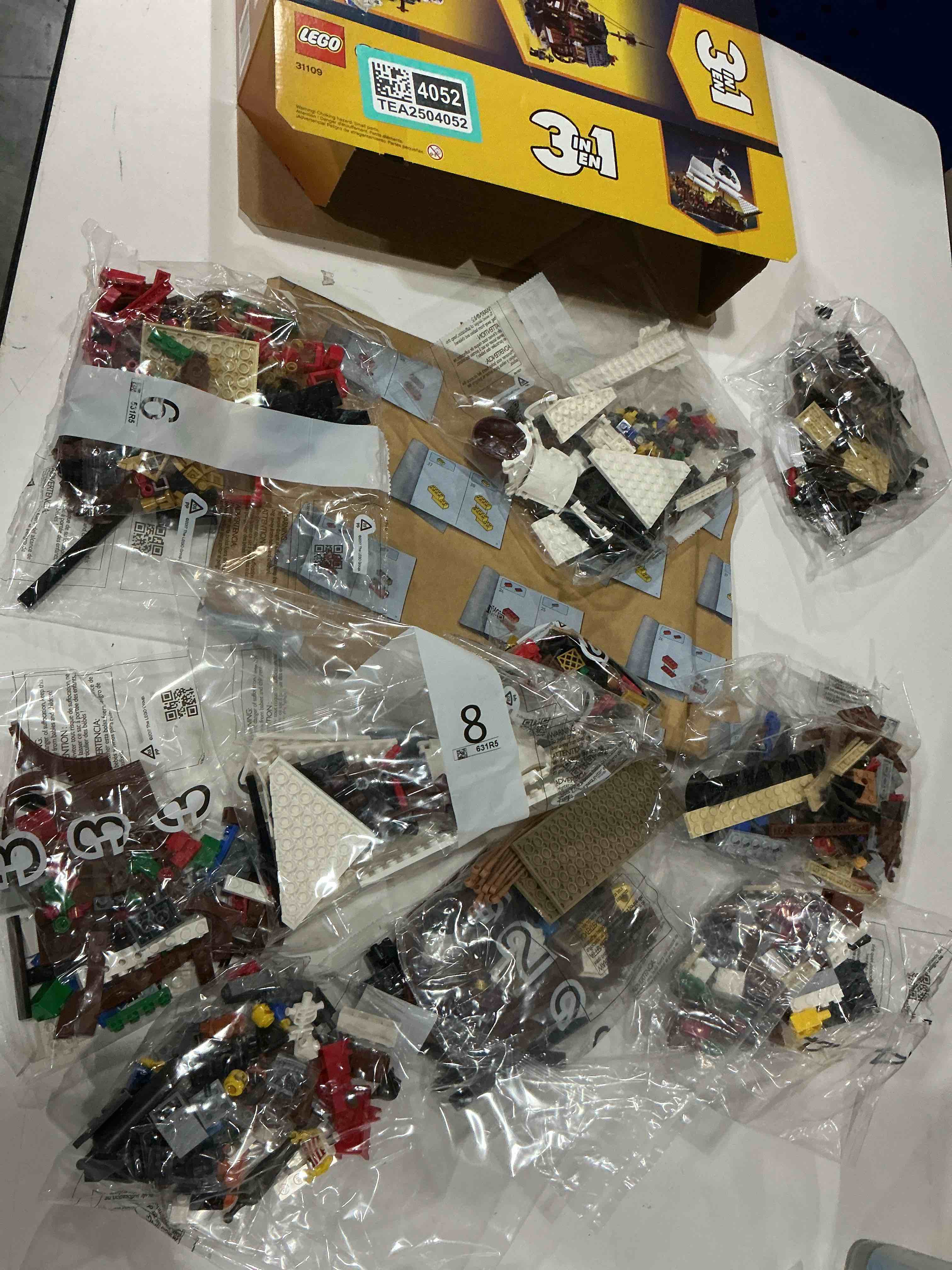 Condition photo showing New/Like New for LEGO Creator 3 in 1 Pirate Ship Building Set, Kids can Rebuild The Pirate Ship into an Inn or Skull Island, Features 4 Minifigures and Shark Toy, Makes a Great Gift for Kids Ages 9+ Years Old, 31109 Standard Packaging