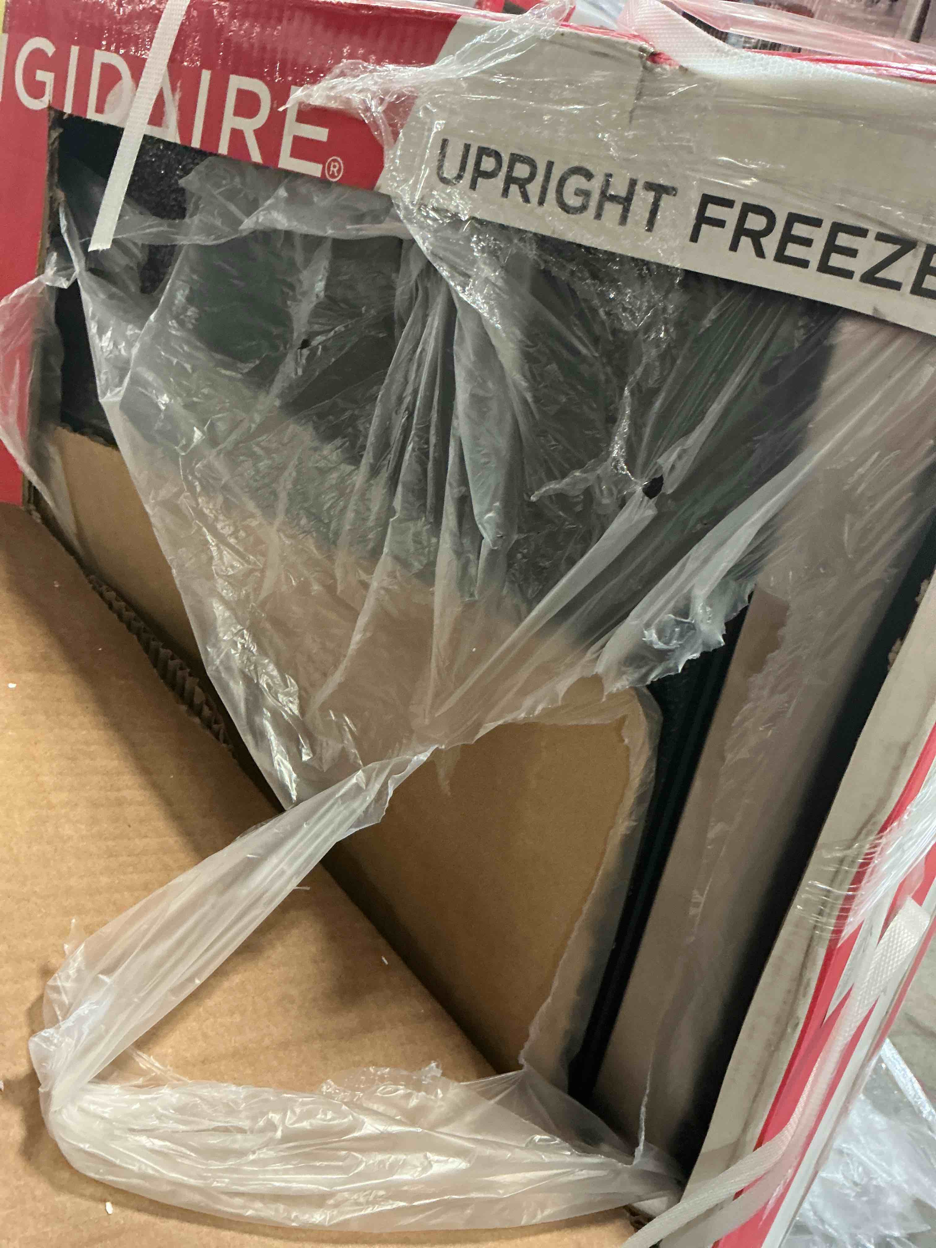 Condition photo showing As Is for Frigidaire 6.5 Cu. ft. Upright Freezer  Platinum