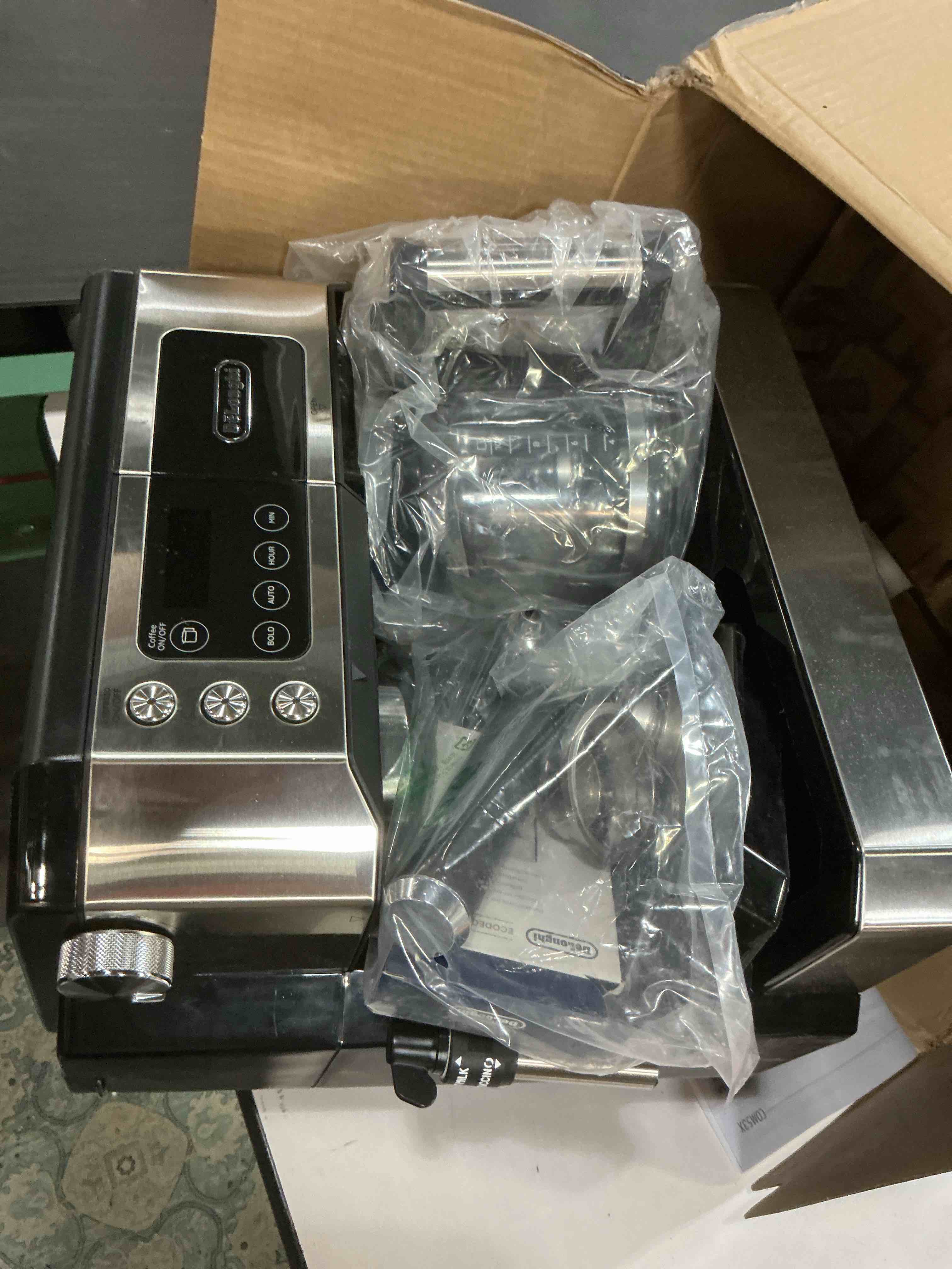 Condition photo showing Good Condition for De'Longhi All-in-One Combination Coffee Maker & Espresso Machine + Advanced Adjustable Milk Frother for Cappuccino & Latte + Glass Coffee Pot 10-Cup, Black, COM532M