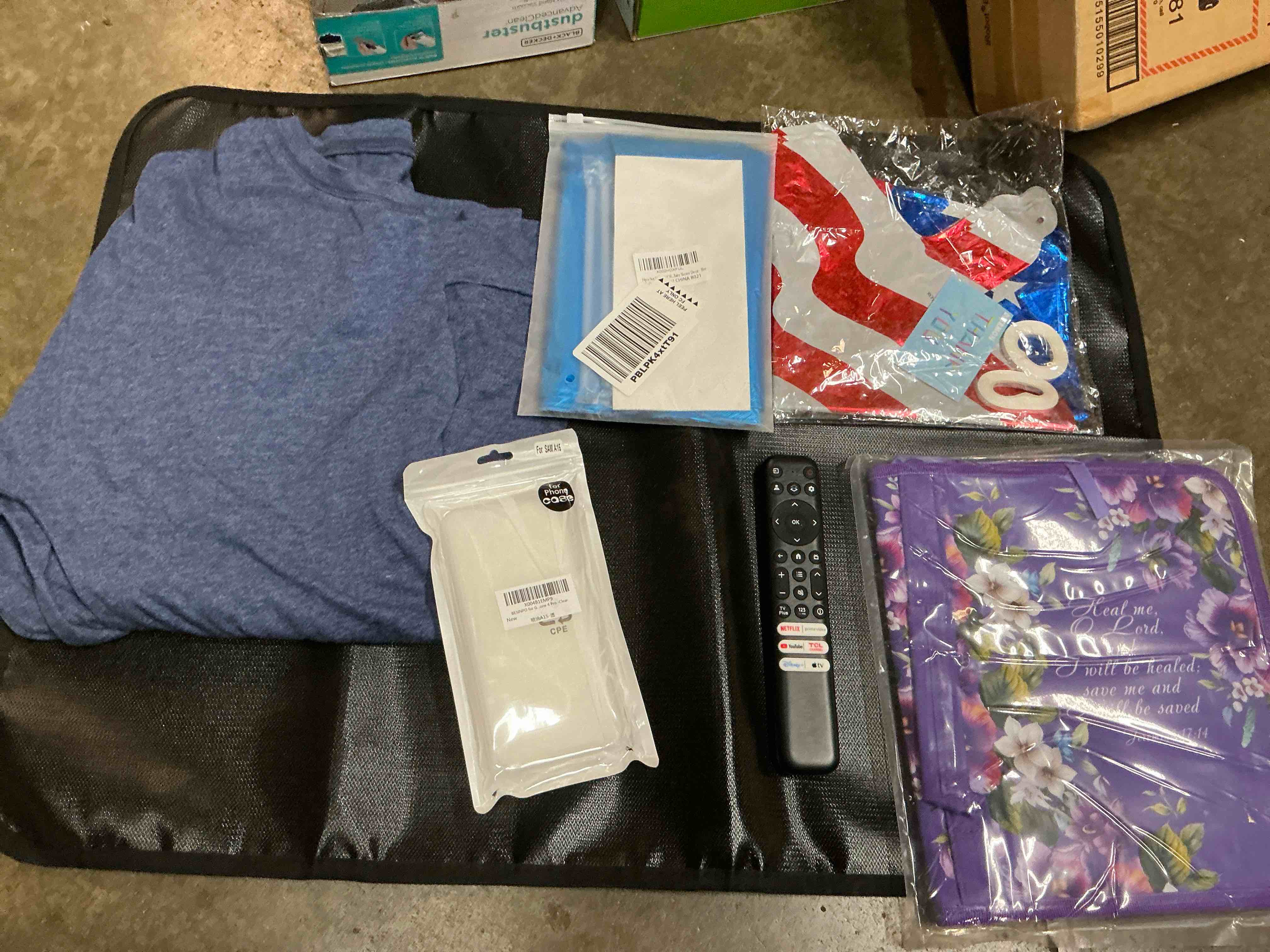 Assorted Home Goods And Decor Bundle Lot, Includes Binder, Balloons, Remote, Case, Shirt And Black Mat