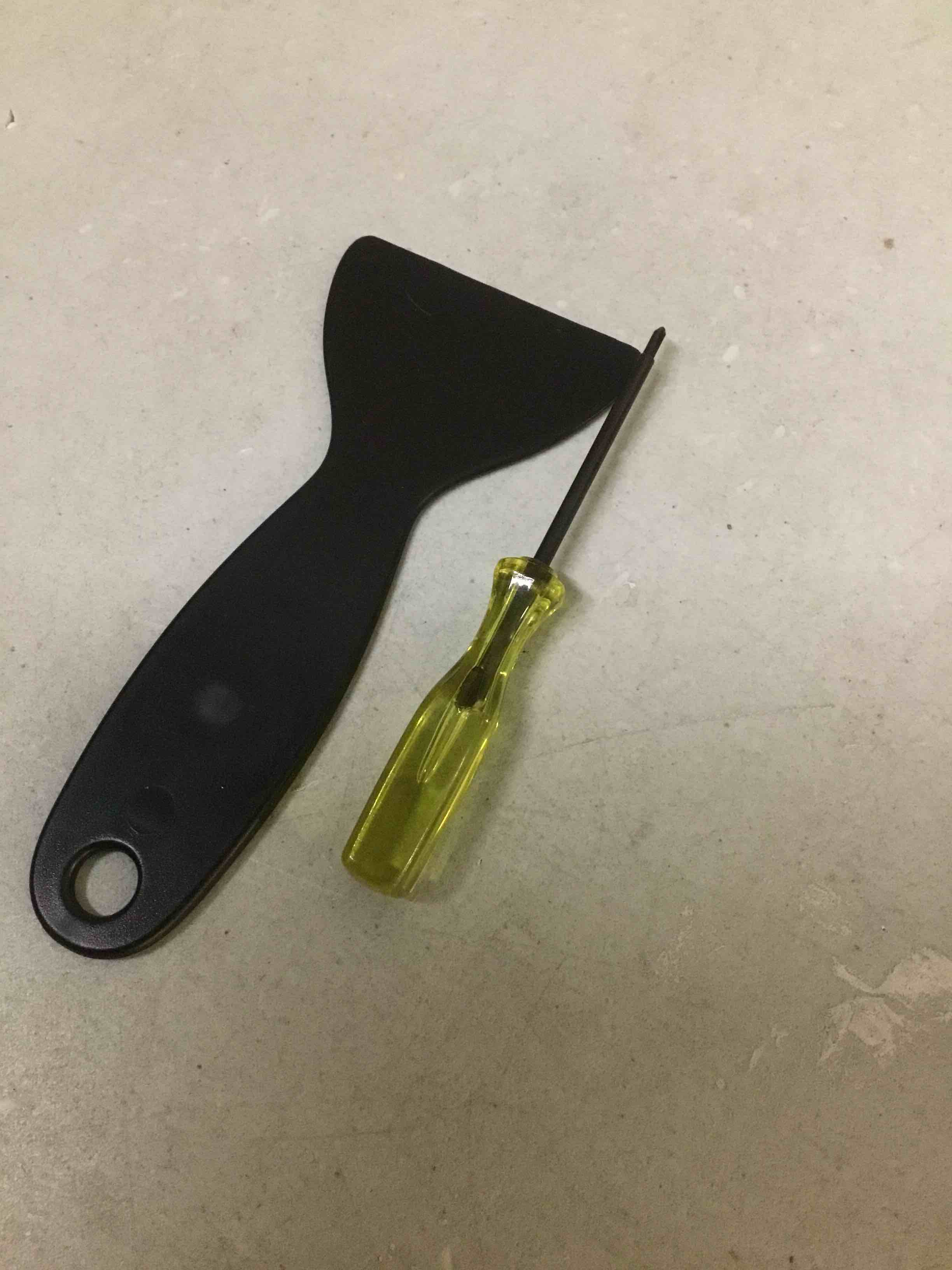 Condition photo showing As Is for screwdriver and scrapper