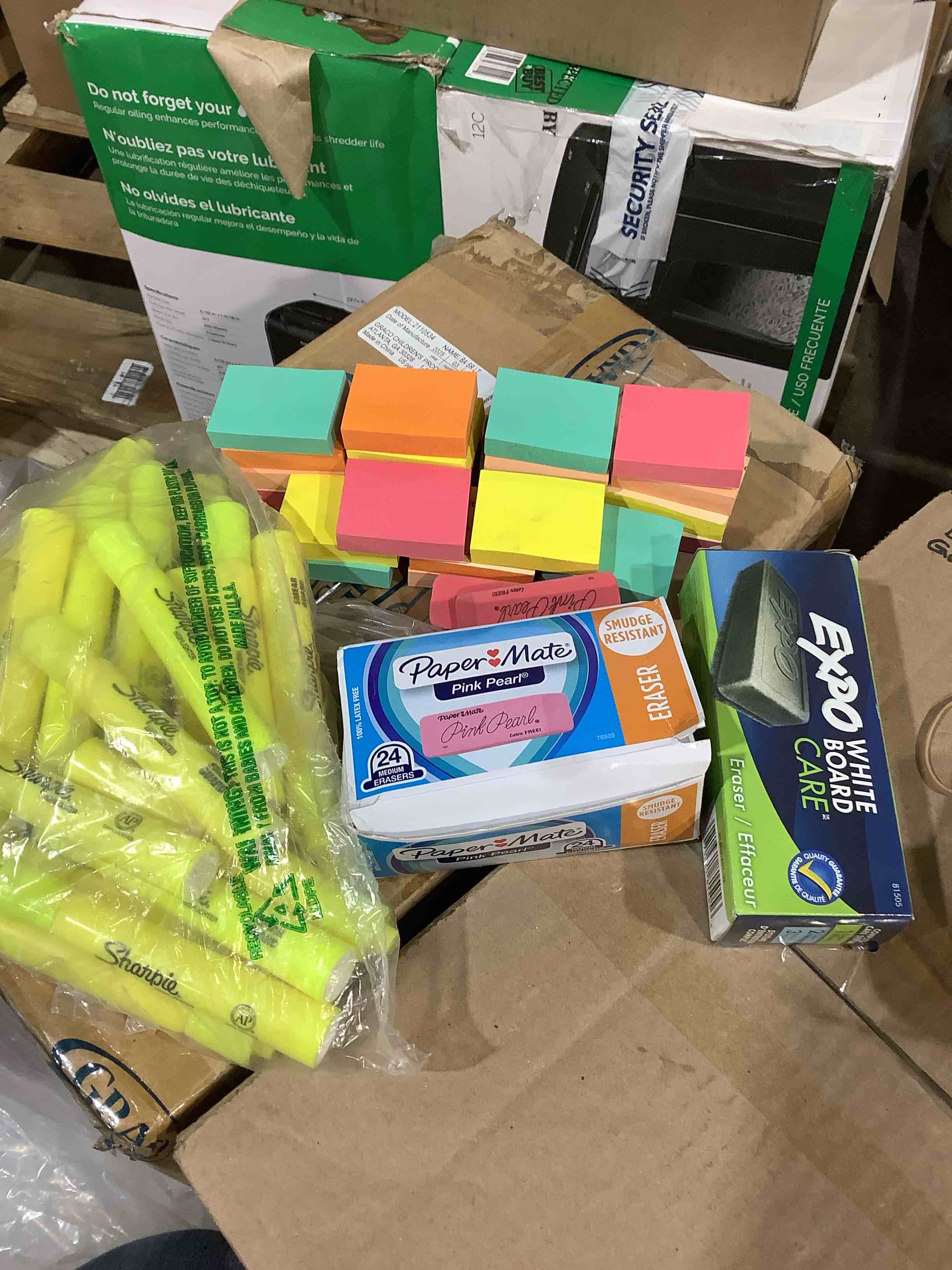  assortment of office supplies: post notes, whiteboard eraser, highlighters, papermate erasers