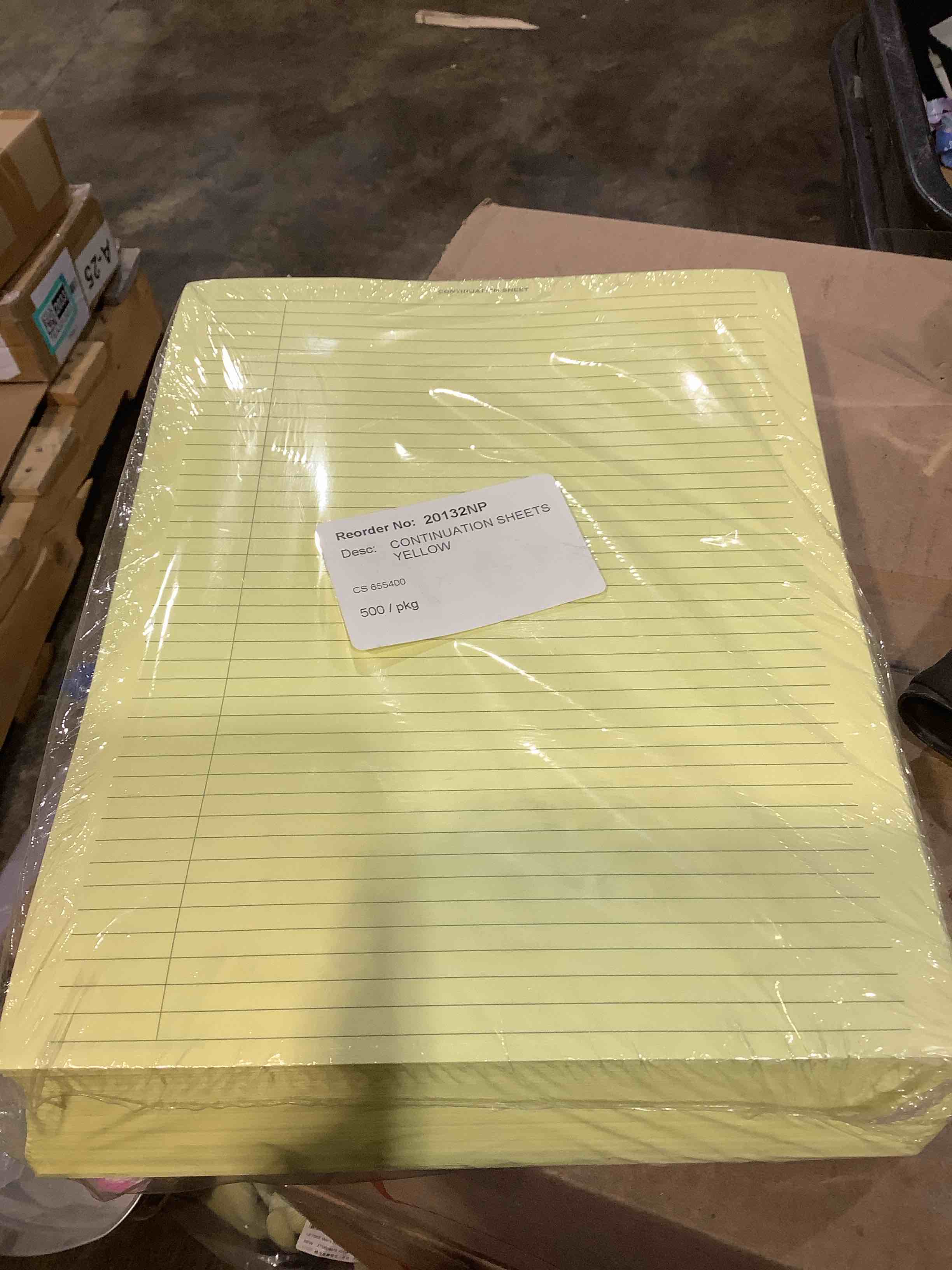 Condition photo showing New/Like New for continuation 8.5" x 11" line sheets yellow, 500 pack