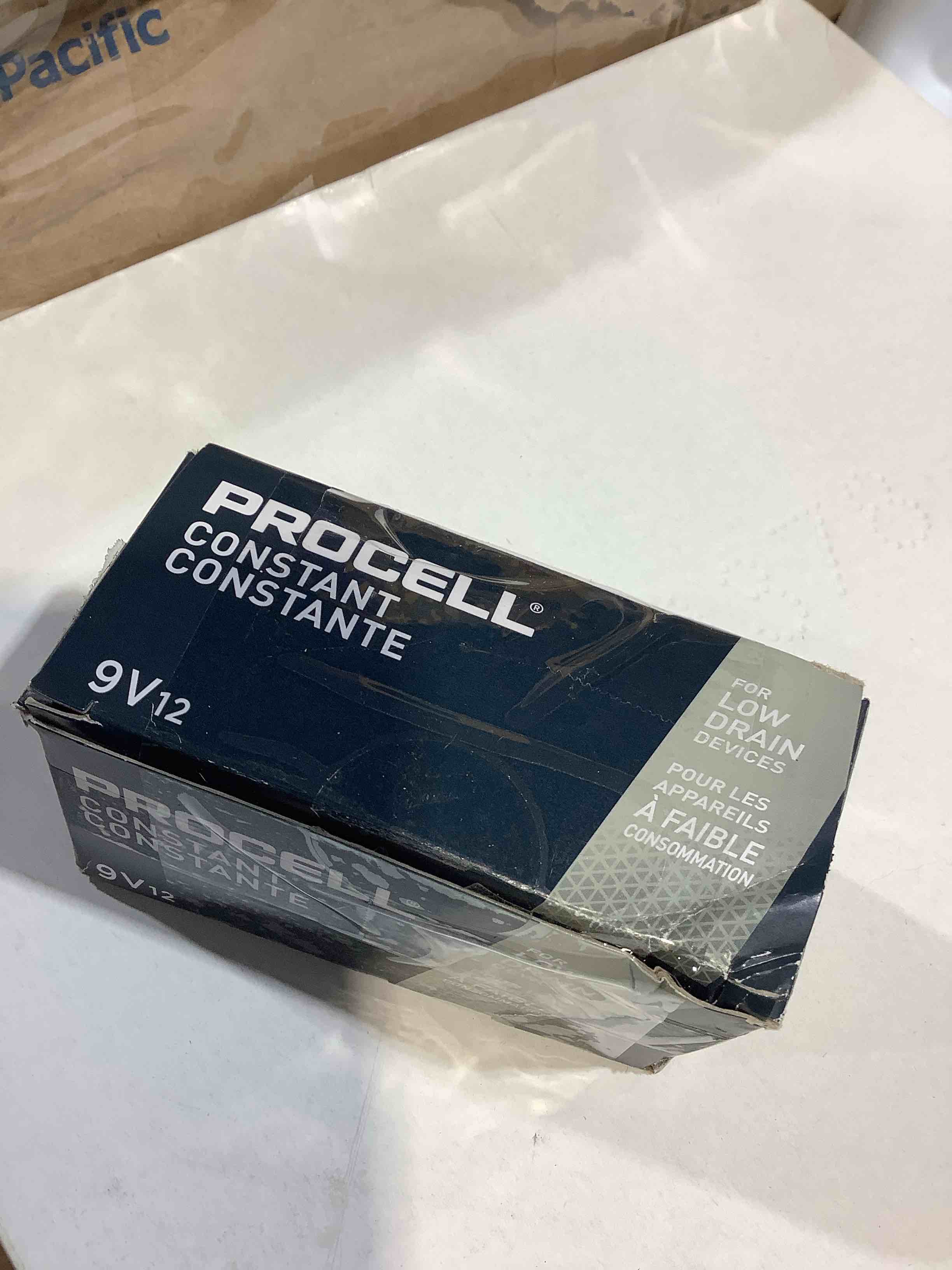 Condition photo showing New/Like New for duracell procell alkaline 9v batries 12 pack, in office